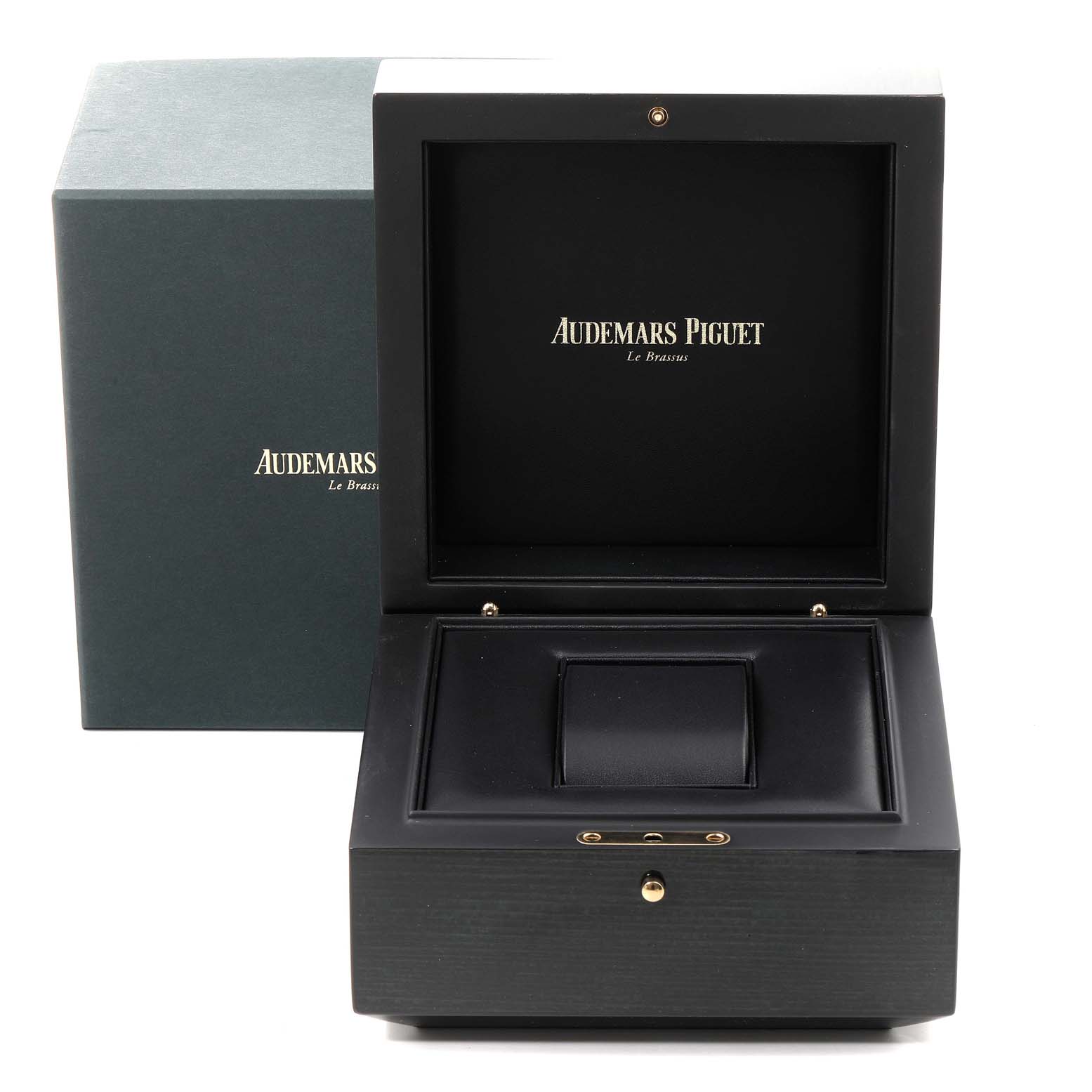 The image shows an open presentation box for a Royal Oak watch by Audemars Piguet, emphasizing the luxurious interior.
