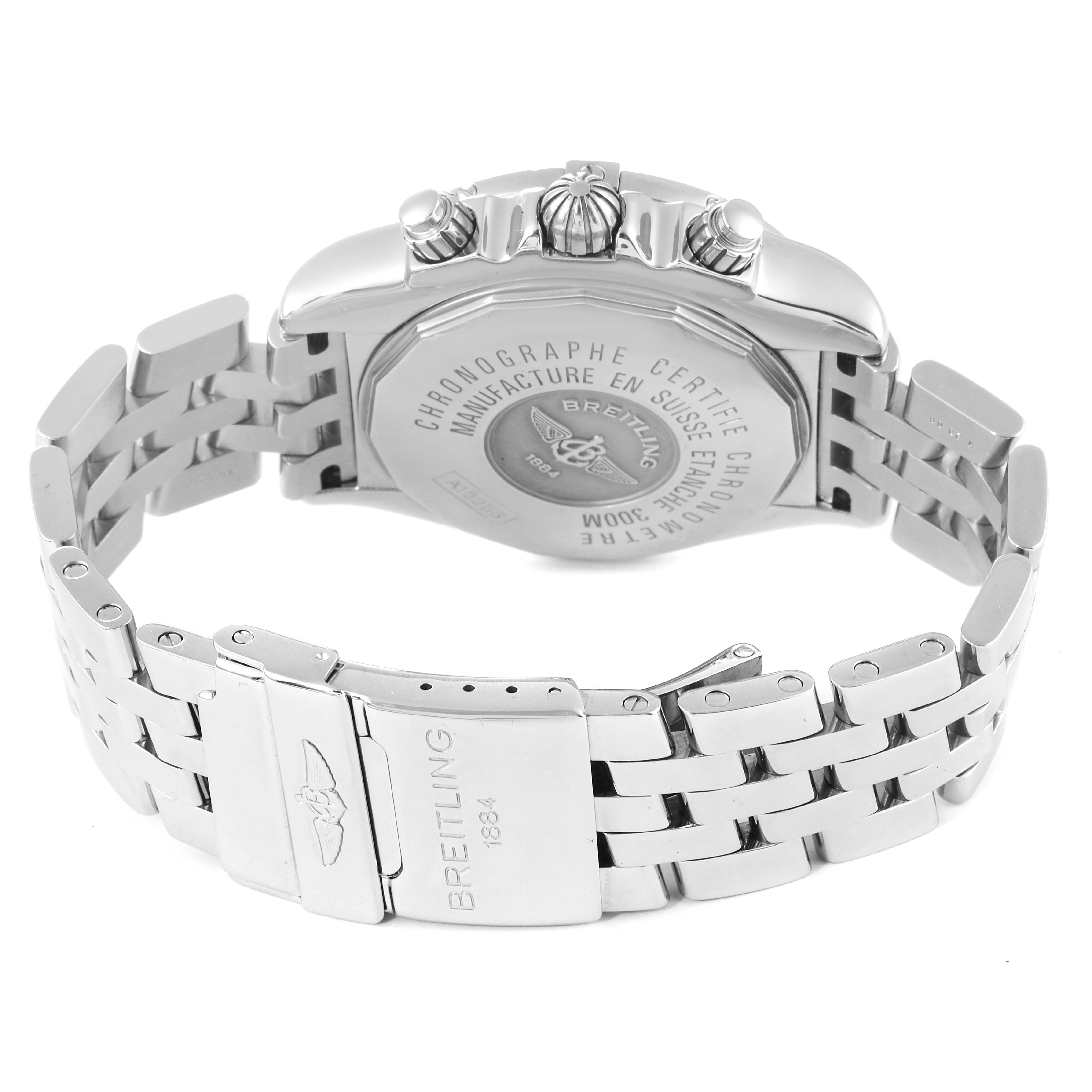 The image shows the back case, crown, and part of the bracelet of a Breitling Chronomat A13356 Men
s Stainless Steel Black Dial A13356 Men
s Stainless Steel Black Dial watch.