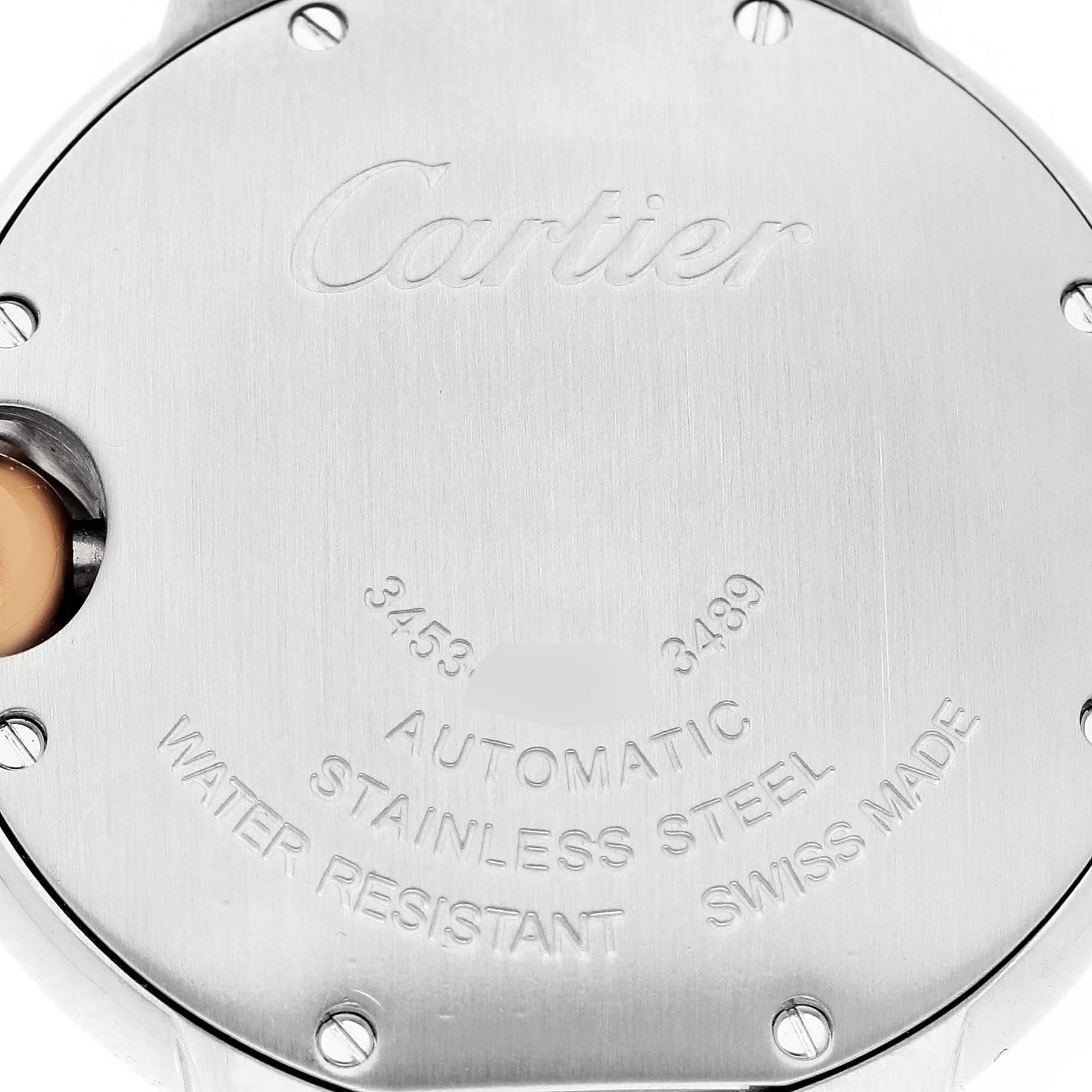 The image shows the back case of a Cartier Ballon Bleu WE902044 Women's Steel and Gold (two tone) Silver Dial watch, highlighting engravings and screws.