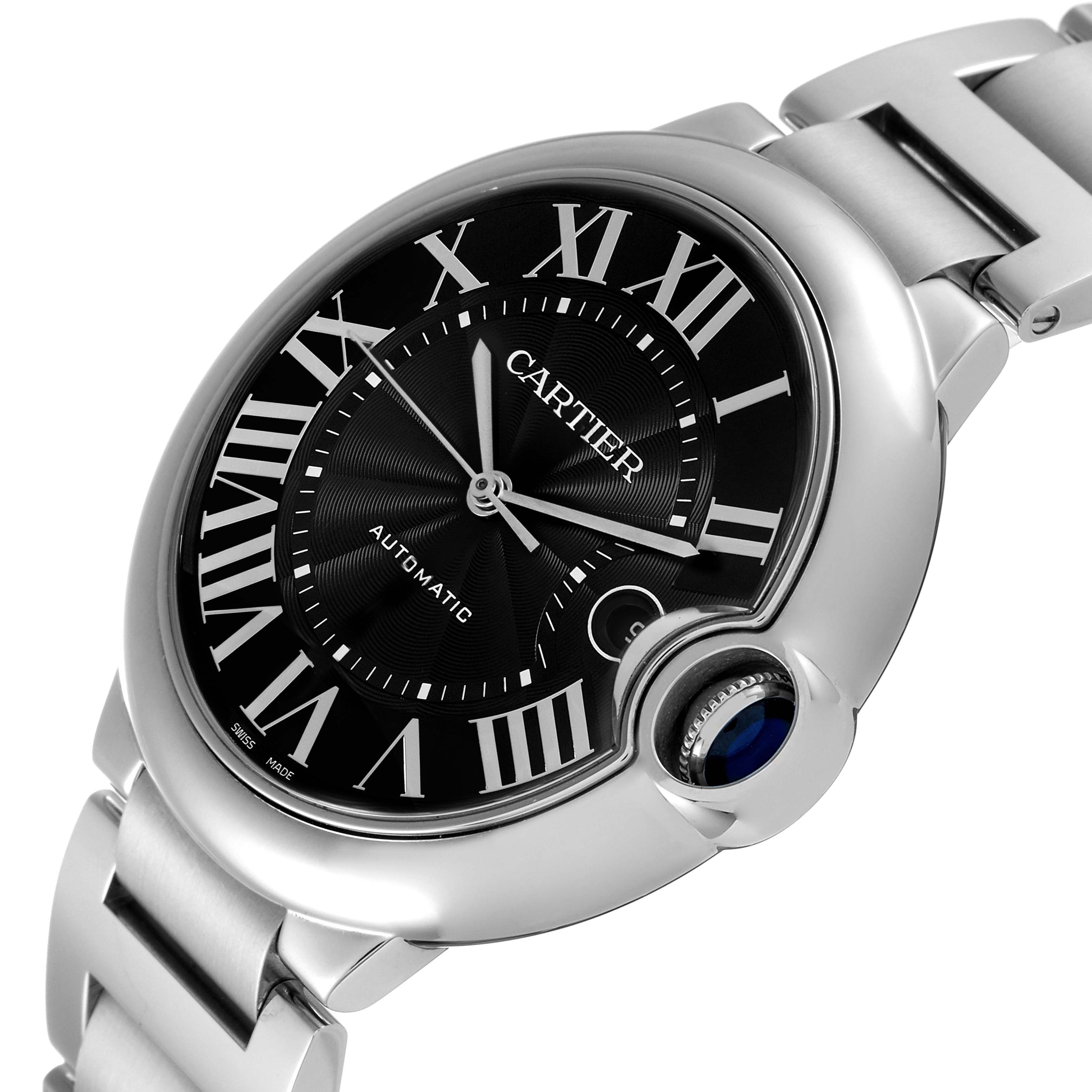 The image shows a close-up view of the Cartier Ballon Bleu W6920042 Men's Stainless Steel Black Dial W6920042 Men's Stainless Steel Black Dial watch, highlighting its black dial, Roman numerals, and the crown with a blue sapphire.