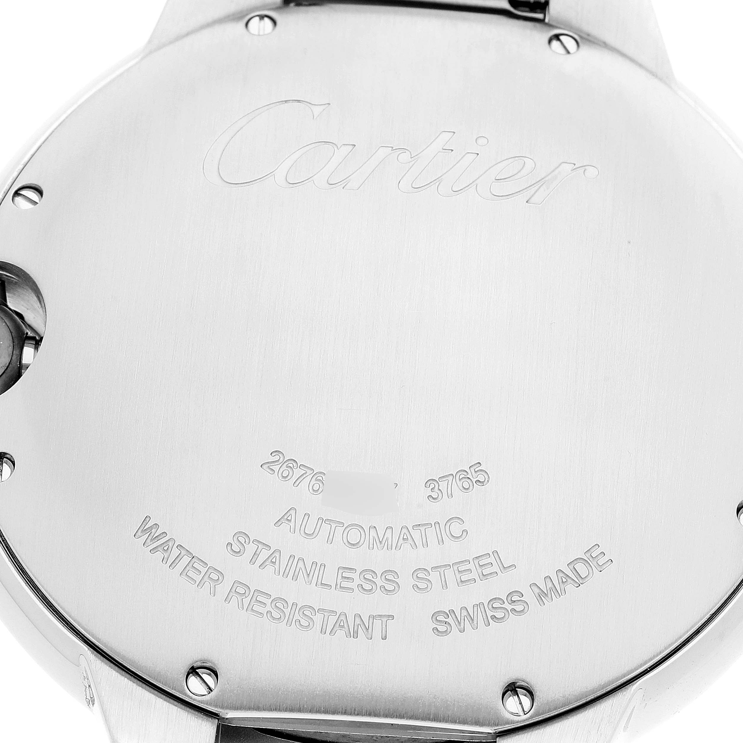 The image shows the back case of the Cartier Ballon Bleu W6920042 Men's Stainless Steel Black Dial W6920042 Men's Stainless Steel Black Dial watch, displaying engravings and screws.