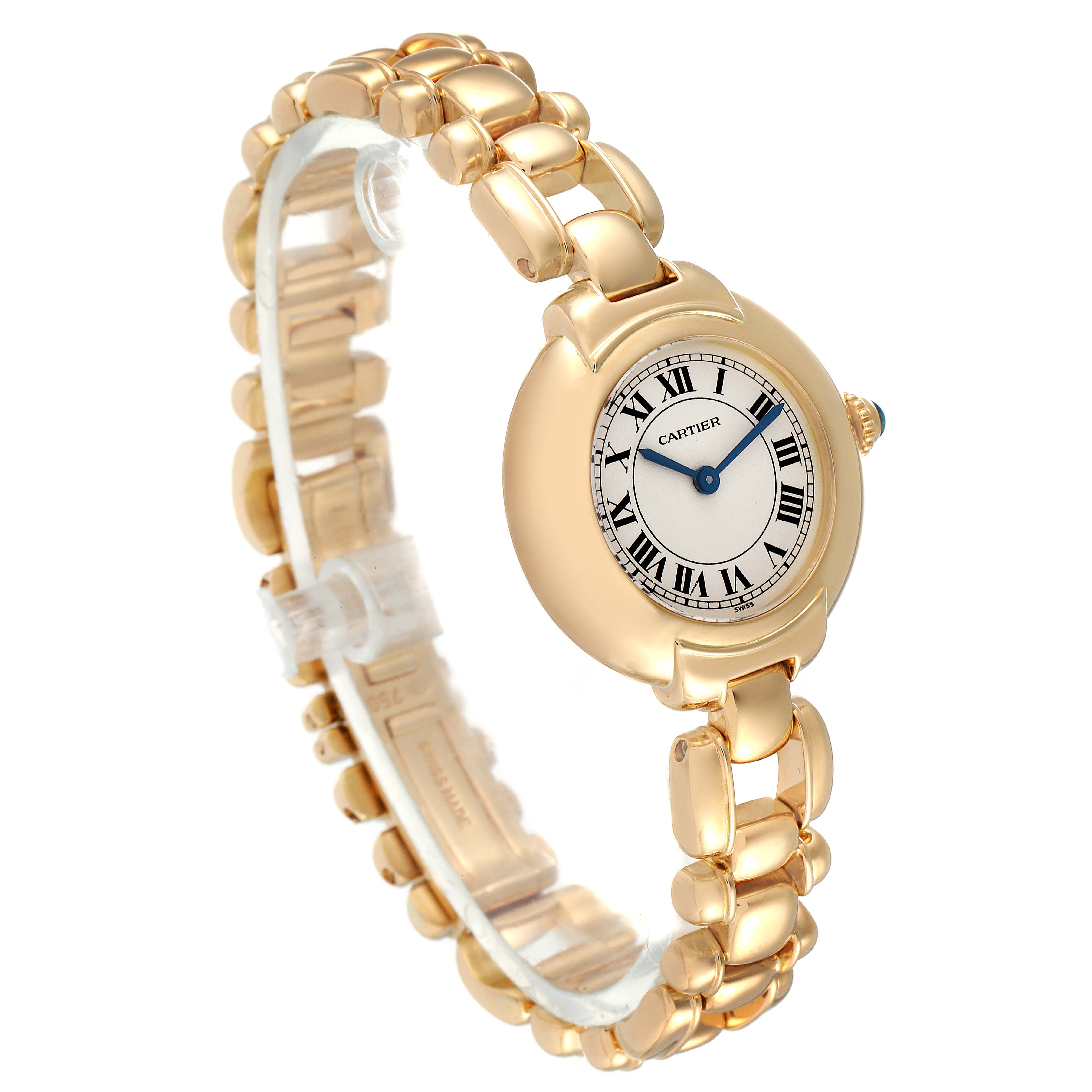 This image shows the Cartier Colisee Women's Yellow Gold Silver Dial Women's Yellow Gold Silver Dial model watch at an angled view, highlighting its round face, gold bracelet, and Roman numeral indices.