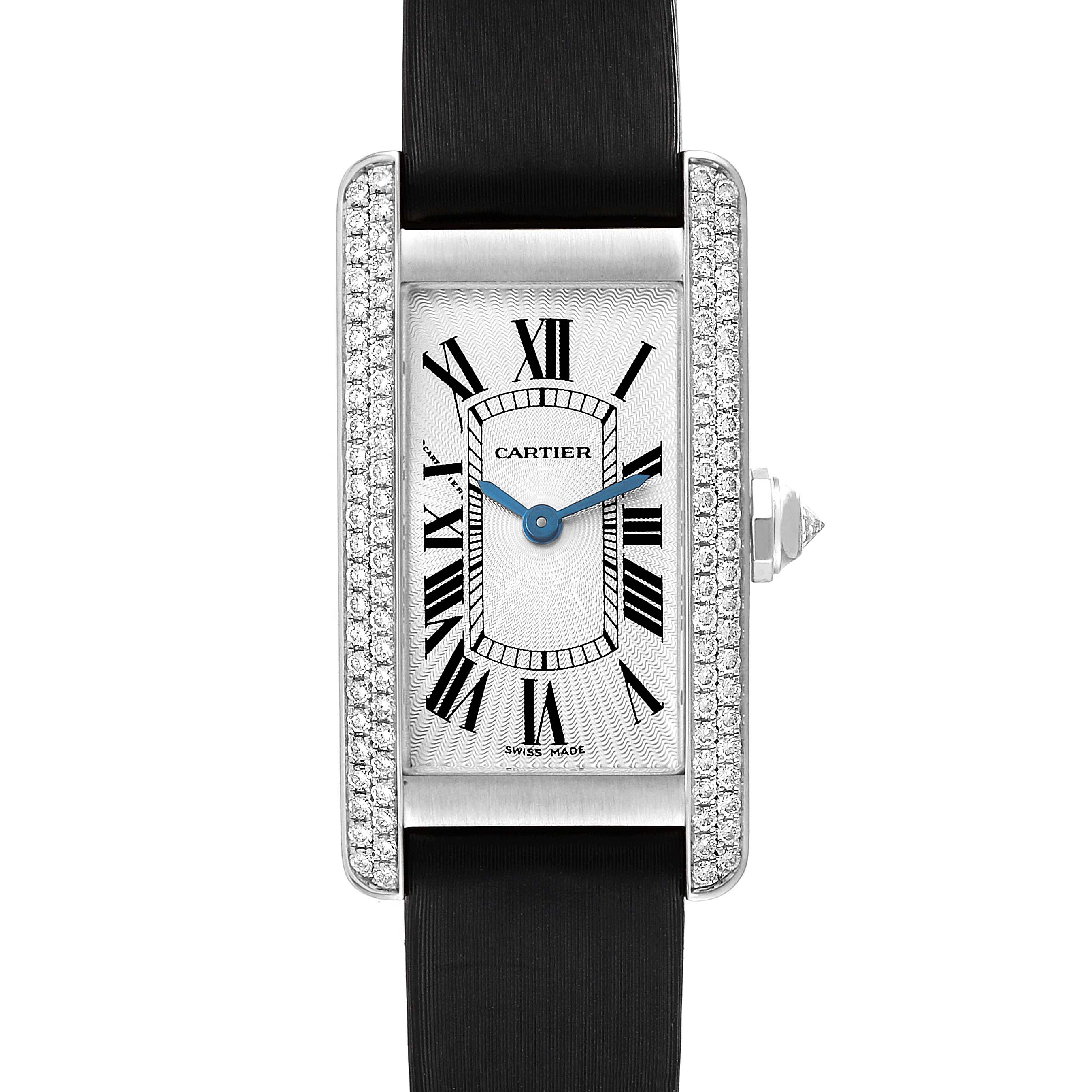 The image shows a frontal view of the Cartier Tank Americaine WB701851 Women's White Gold Silver Dial WB701851 Women's White Gold Silver Dial watch, highlighting its rectangular face with Roman numerals, diamond-set bezel, and black strap.