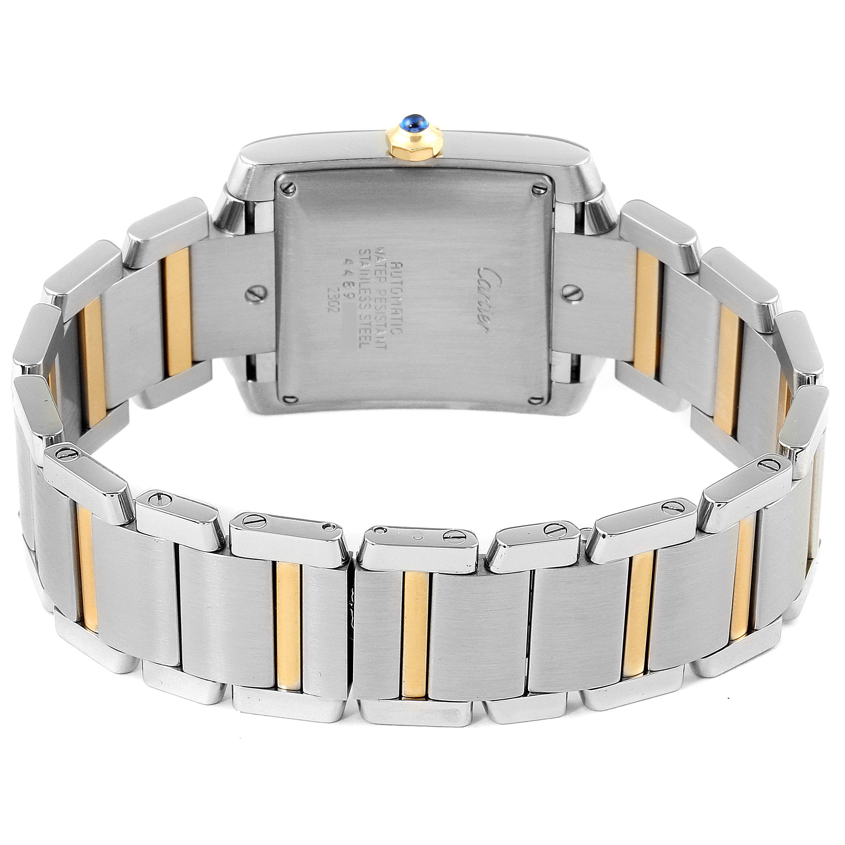 The Cartier Tank Francaise W51005Q4 Men's Steel and Gold (two tone) Silver Dial W51005Q4 Men's Steel and Gold (two tone) Silver Dial watch is shown from the back, highlighting its two-tone metal band and case back details.