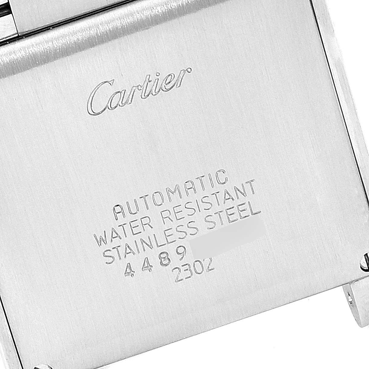 The image shows the back case of a Cartier Tank Francaise W51005Q4 Men's Steel and Gold (two tone) Silver Dial W51005Q4 Men's Steel and Gold (two tone) Silver Dial watch, highlighting branding and specifications.