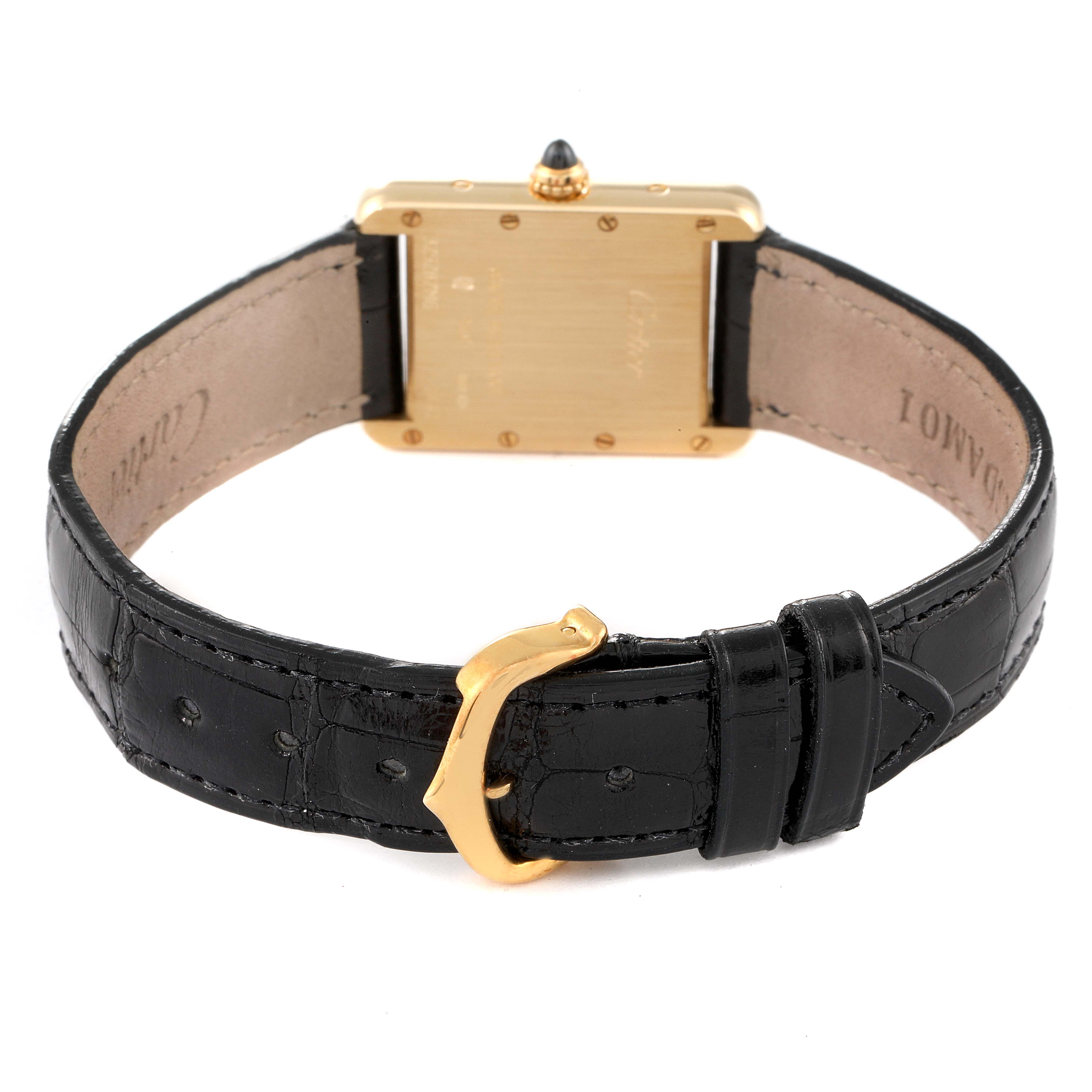 The image shows the back view of a Cartier Tank Louis W1529856 Women
s Yellow Gold Silver Dial W1529856 Women
s Yellow Gold Silver Dial watch, highlighting the clasp and leather strap.