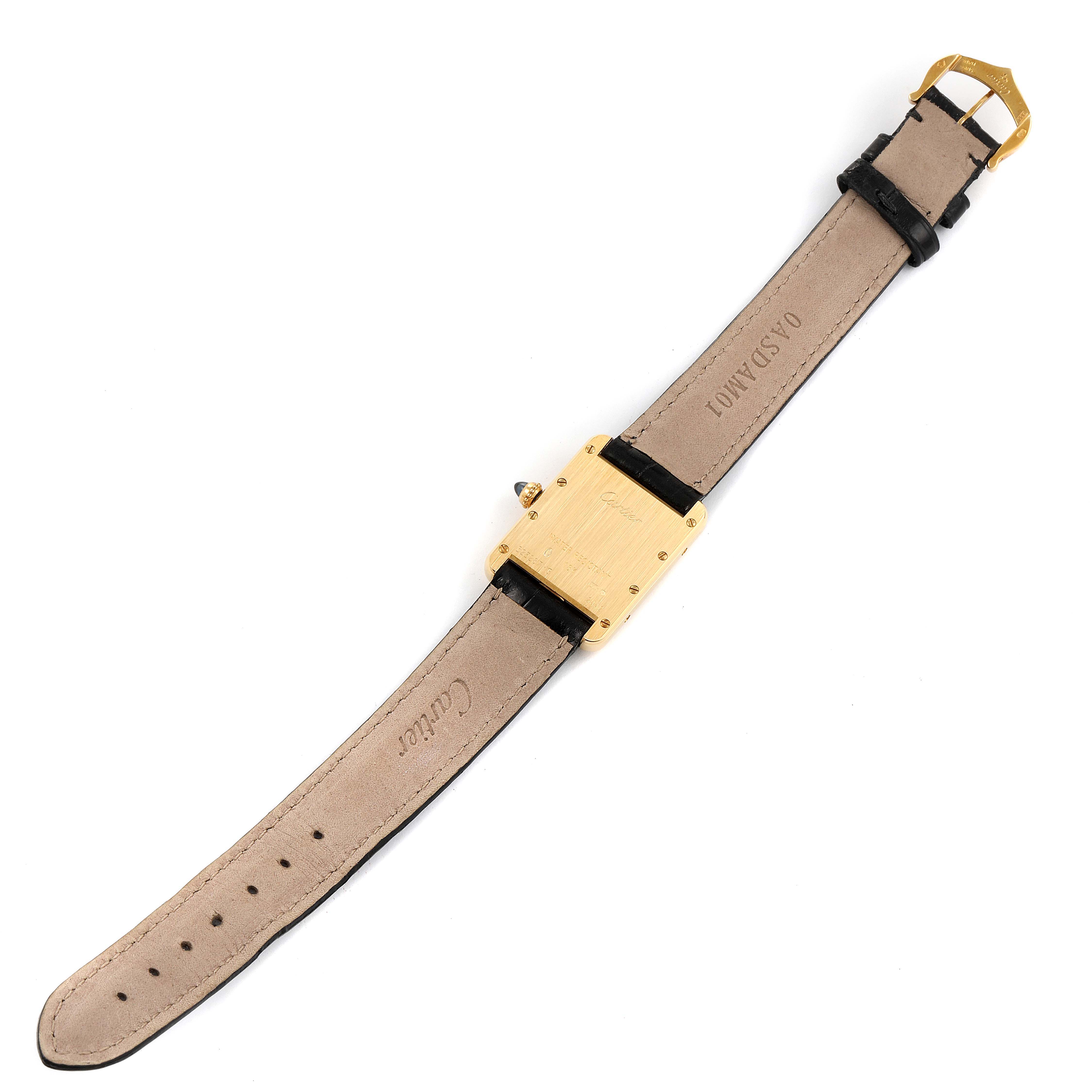 This image shows the backside of a Cartier Tank Louis W1529856 Women
s Yellow Gold Silver Dial W1529856 Women
s Yellow Gold Silver Dial watch, highlighting the strap, buckle, and case back.