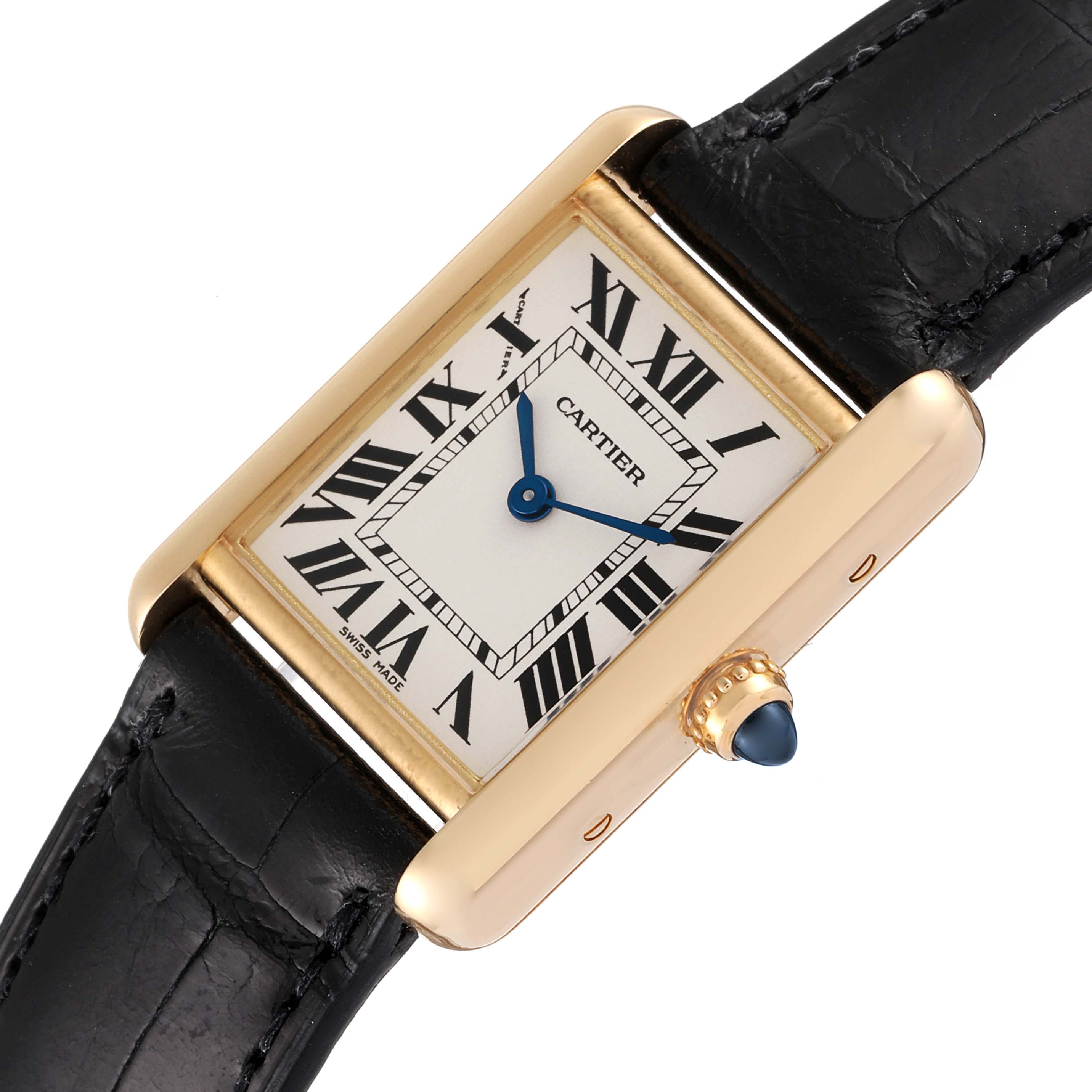This image shows a top-down view of the Cartier Tank Louis W1529856 Women
s Yellow Gold Silver Dial W1529856 Women
s Yellow Gold Silver Dial watch, highlighting its rectangular face, Roman numerals, and black leather strap.