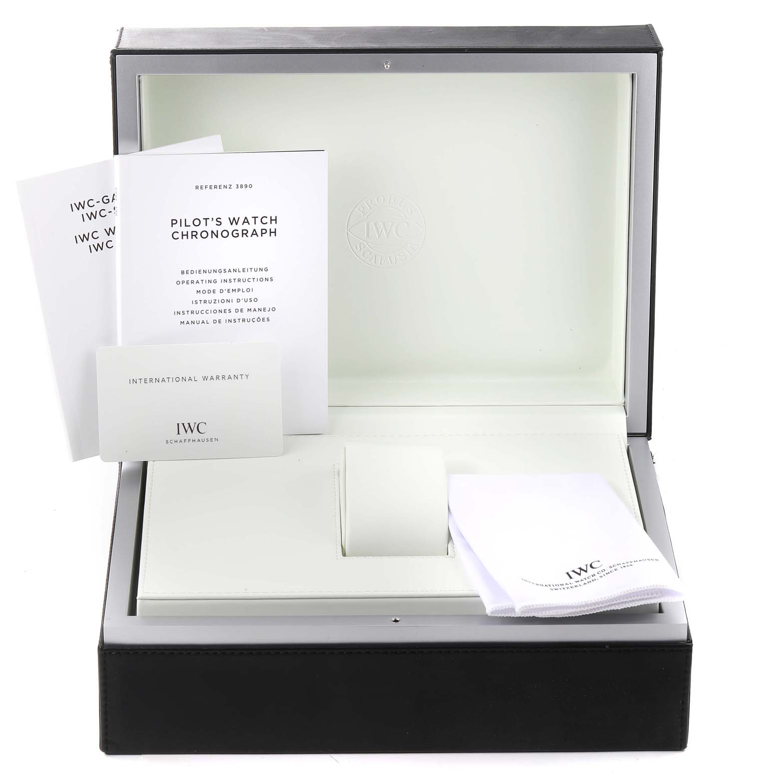 The image shows the packaging box, manuals, warranty card, and cleaning cloth for an IWC Pilot IW389002 Men's Ceramic Black Dial IW389002 Men's Ceramic Black Dial model watch.