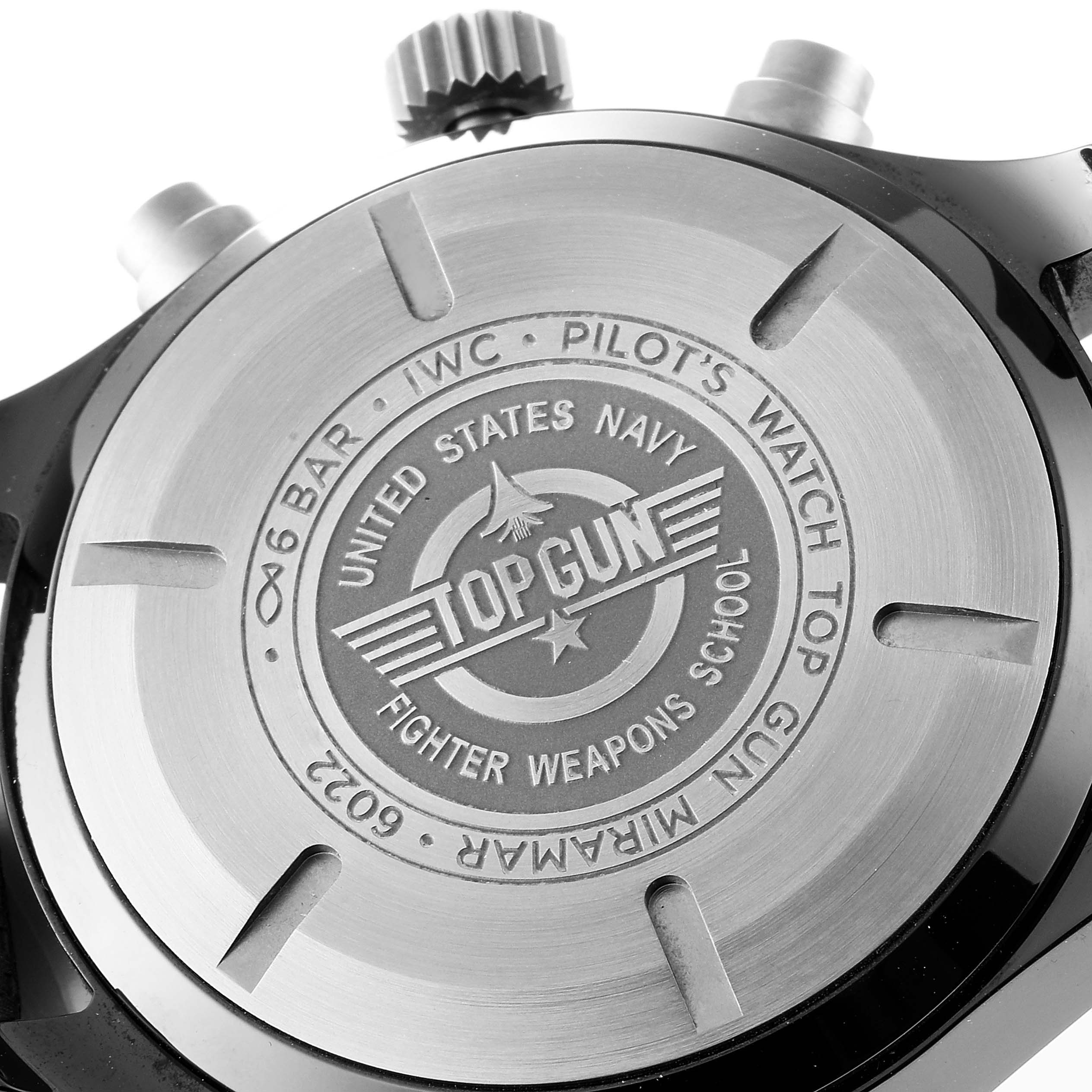 The image shows the case back, crown, and pushers of an IWC Pilot IW389002 Men's Ceramic Black Dial IW389002 Men's Ceramic Black Dial's Watch Top Gun model.