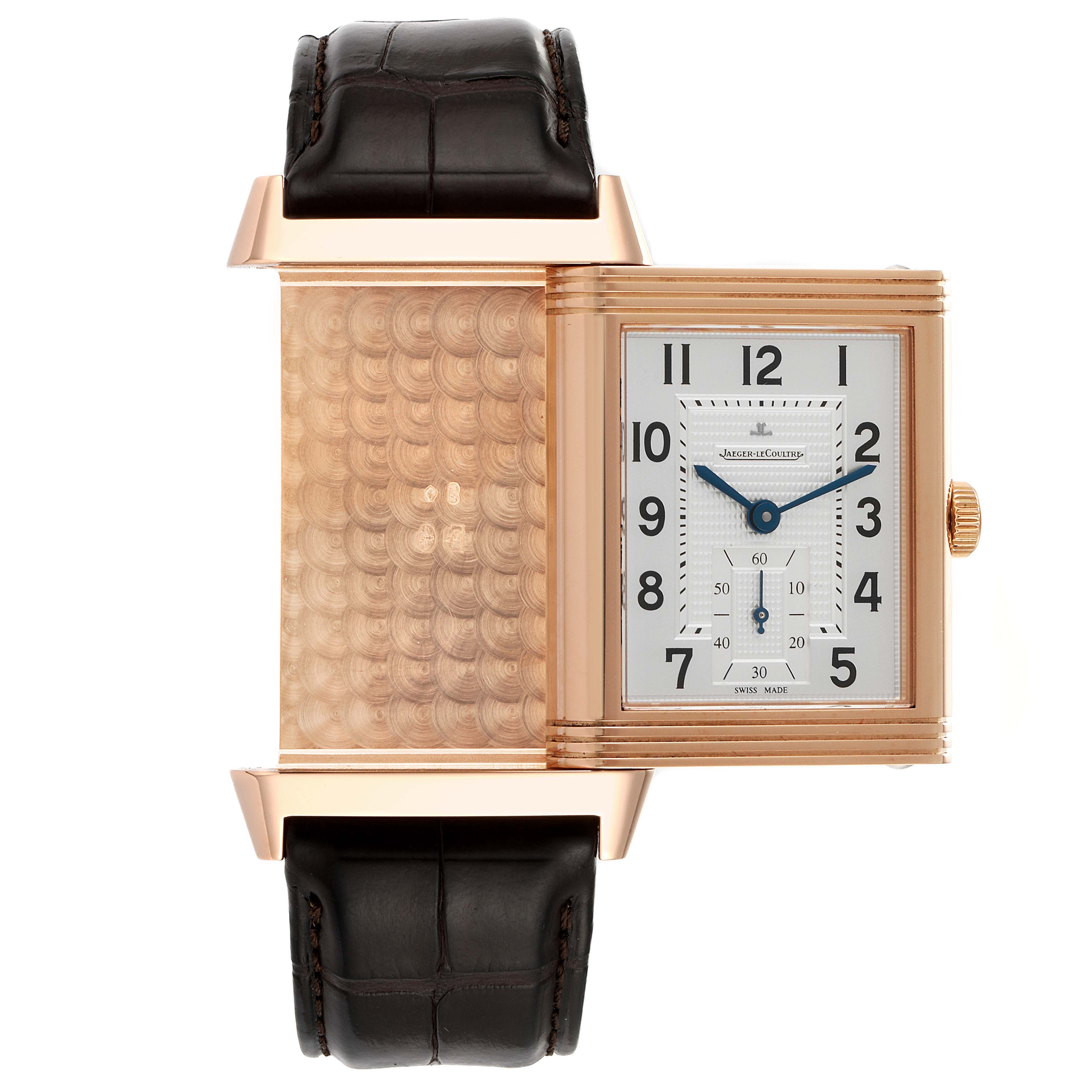 The image shows a front view of the Jaeger LeCoultre Reverso Q3732420 Men
s Rose Gold Silver Dial Q3732420 Men
s Rose Gold Silver Dial watch, with its reversible case partly extended to display the decorative back.