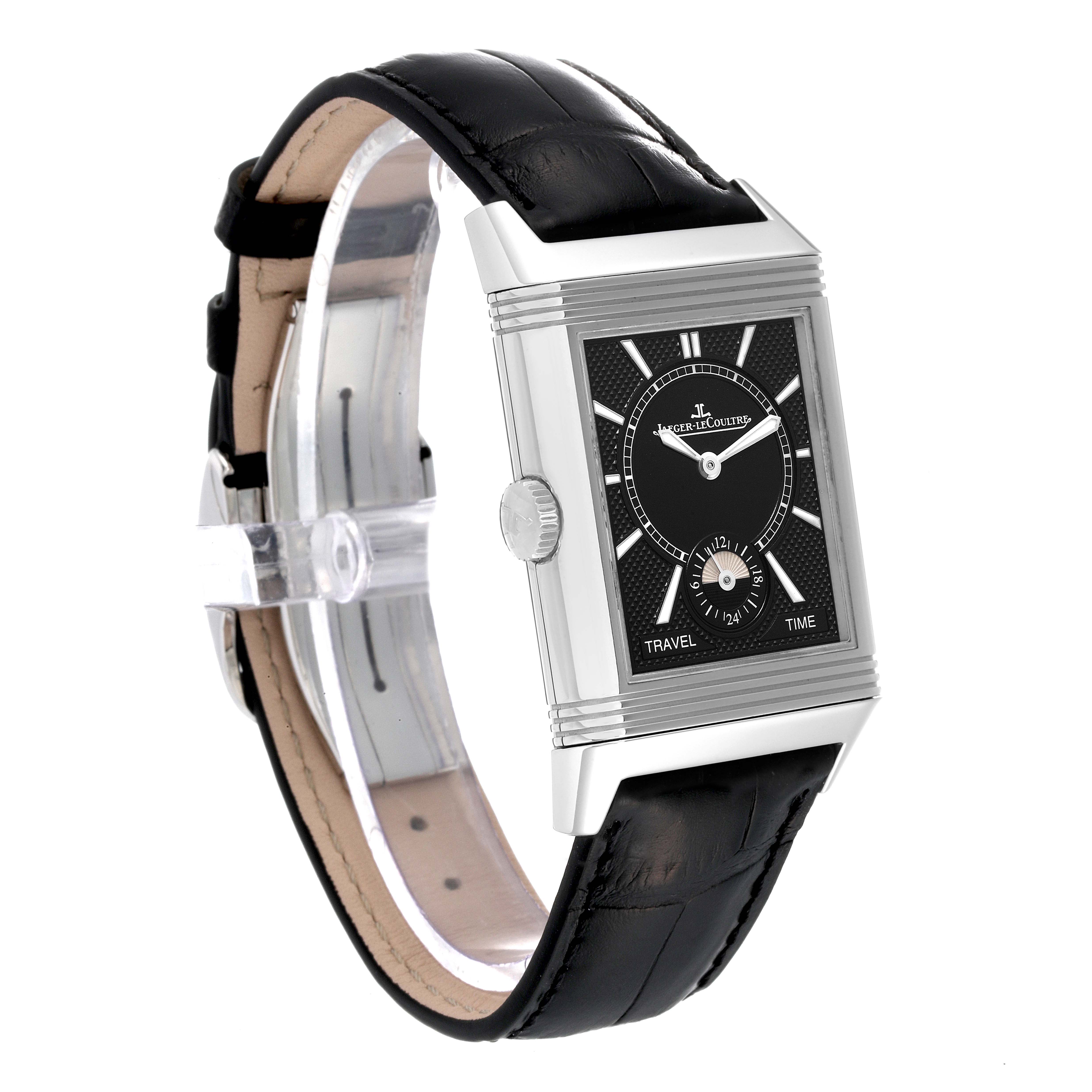 This image shows a Jaeger-LeCoultre Reverso watch at a three-quarter angle, highlighting its rectangular case, black dial, and leather strap.