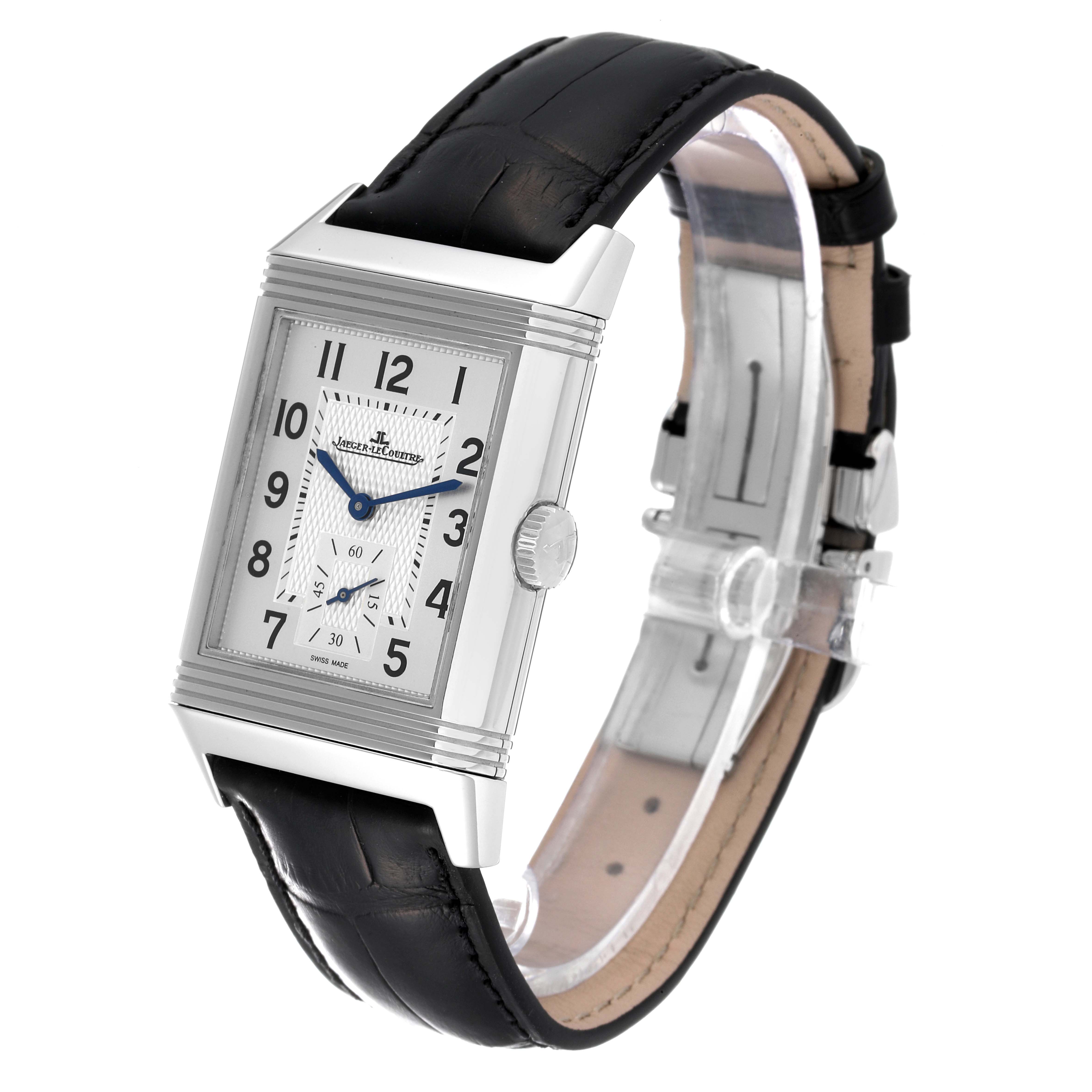 The Jaeger LeCoultre Reverso Q3848420 Men's Stainless Steel Silver Dial Q3848420 Men's Stainless Steel Silver Dial watch is shown at a 3/4 angle, displaying its rectangular face, leather strap, and side crown.