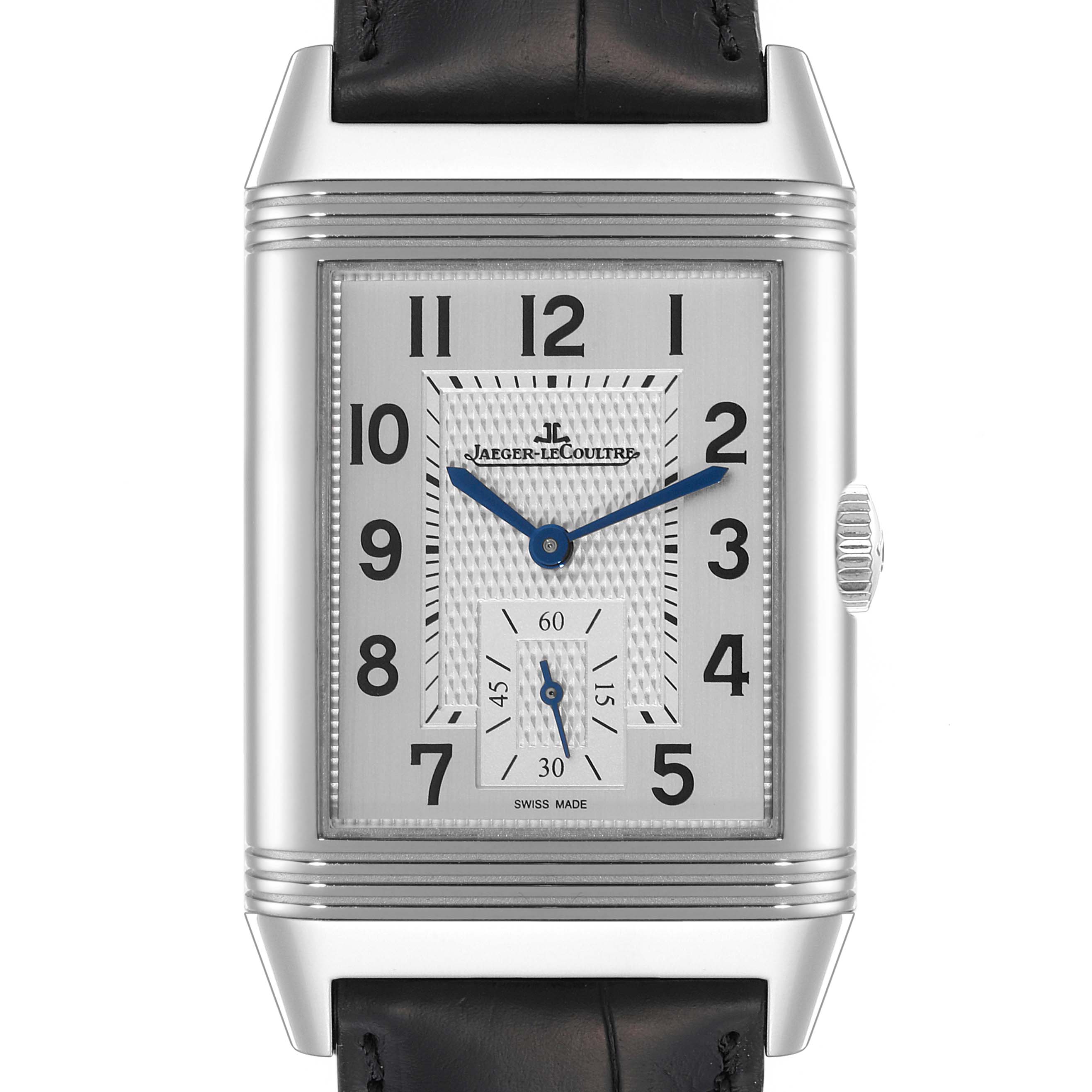 The Jaeger-LeCoultre Reverso watch is shown from a front angle, displaying the dial, numbers, hands, and part of the strap.