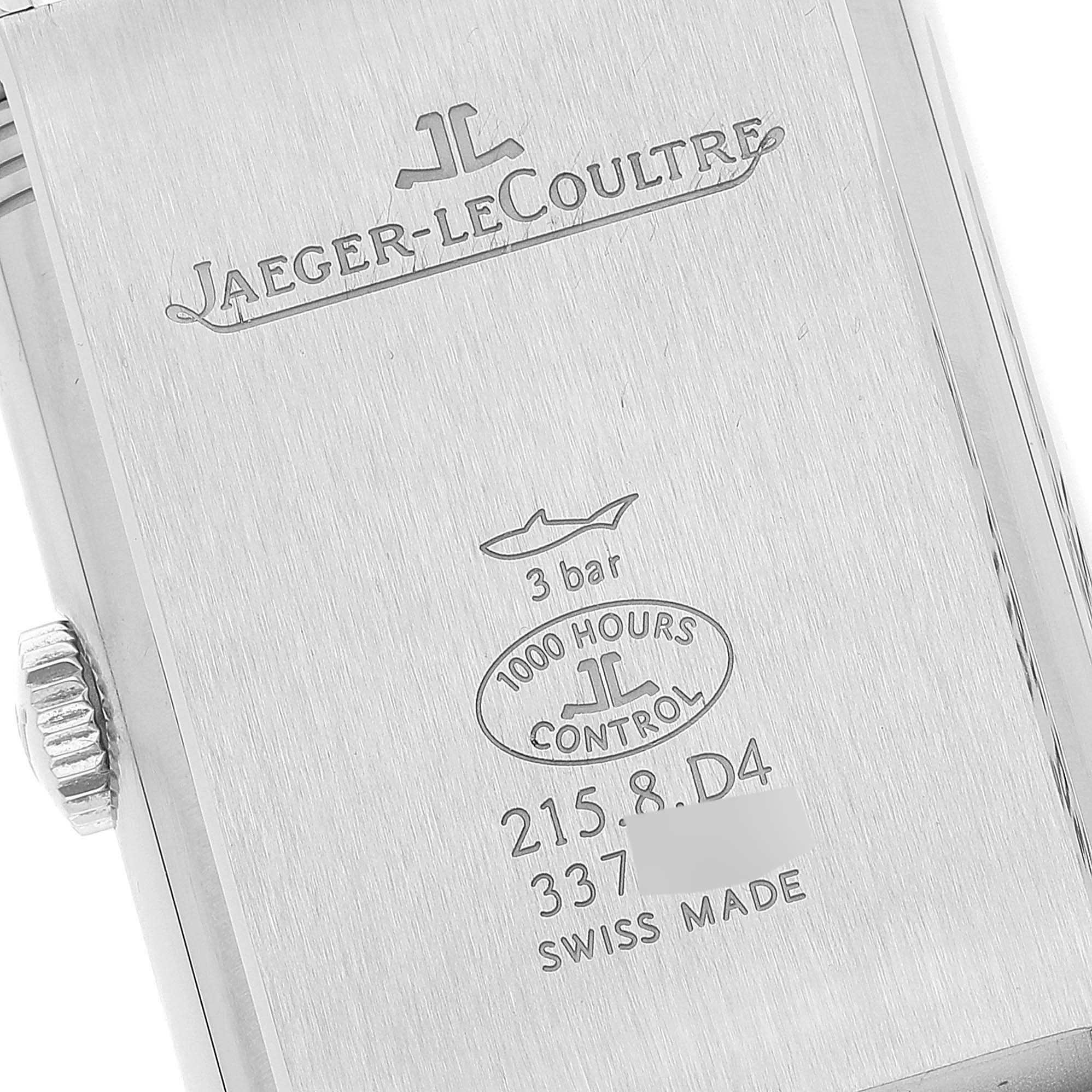 This image shows the back case of a Jaeger-LeCoultre Reverso watch, including the brand, model details, and a portion of the crown.