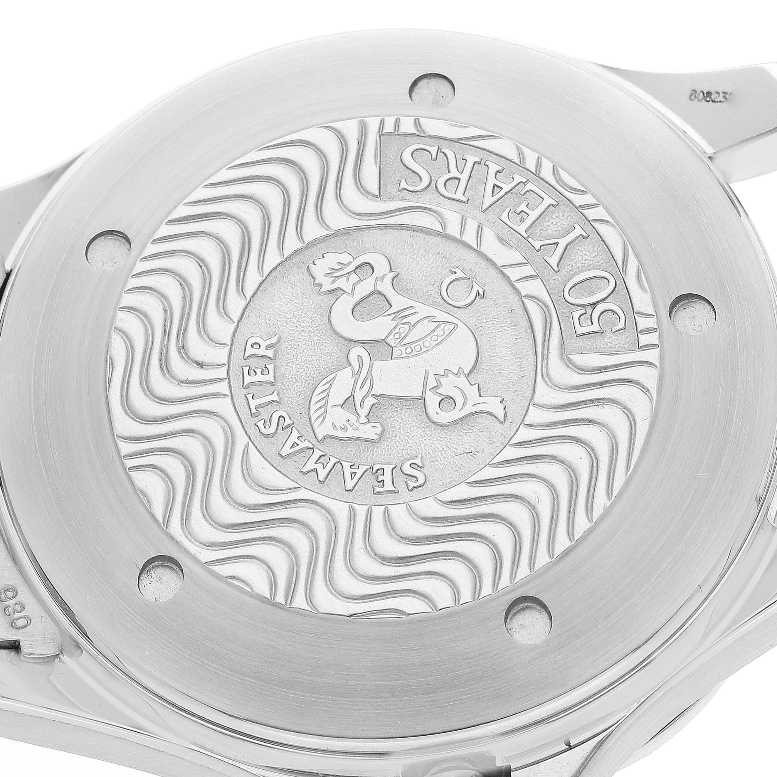 This image shows the case back of an Omega Seamaster 2234.50.00 Men's Stainless Steel Black Dial 2234.50.00 Men's Stainless Steel Black Dial watch, highlighting its emblem and engraved text.