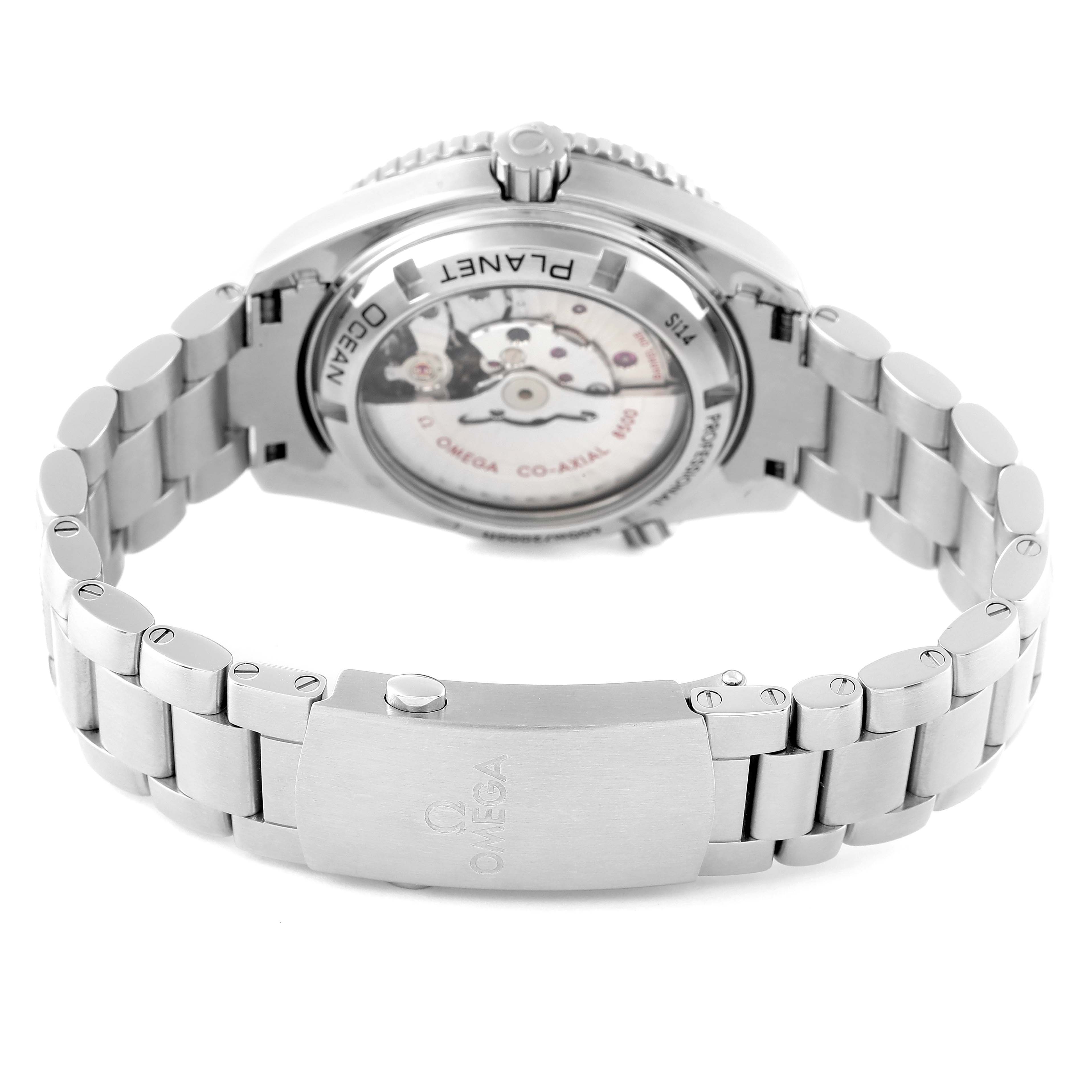 The image shows the back view of the Omega Planet Ocean 232.30.42.21.04.001 Men
s Stainless Steel White Dial 232.30.42.21.04.001 Men
s Stainless Steel White Dial watch, focusing on the transparent case back and the metal bracelet with the Omega clasp.