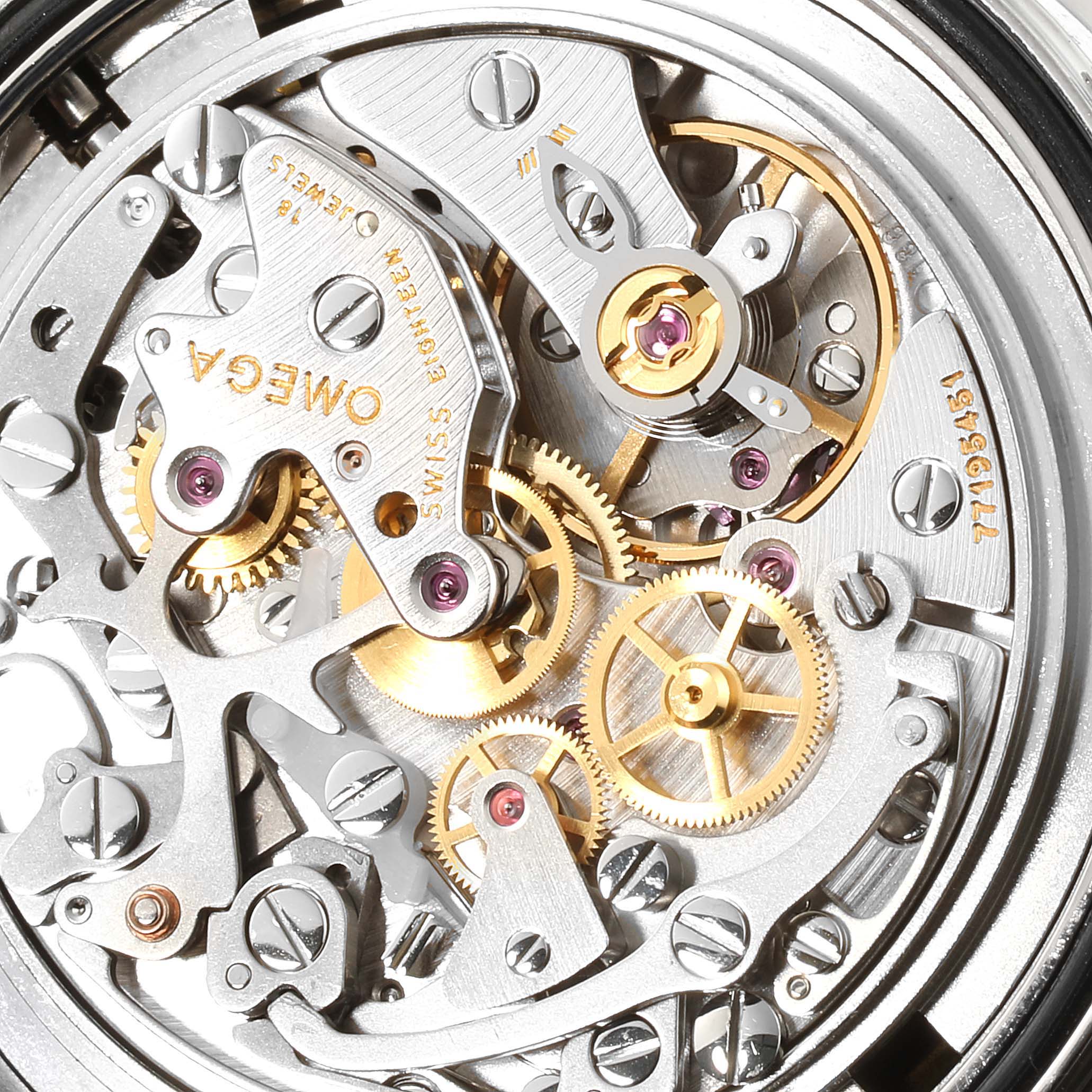 The image shows a close-up of the internal mechanical movement of an Omega Speedmaster 3570.50.00 Men
s Stainless Steel Black Dial 3570.50.00 Men
s Stainless Steel Black Dial watch.