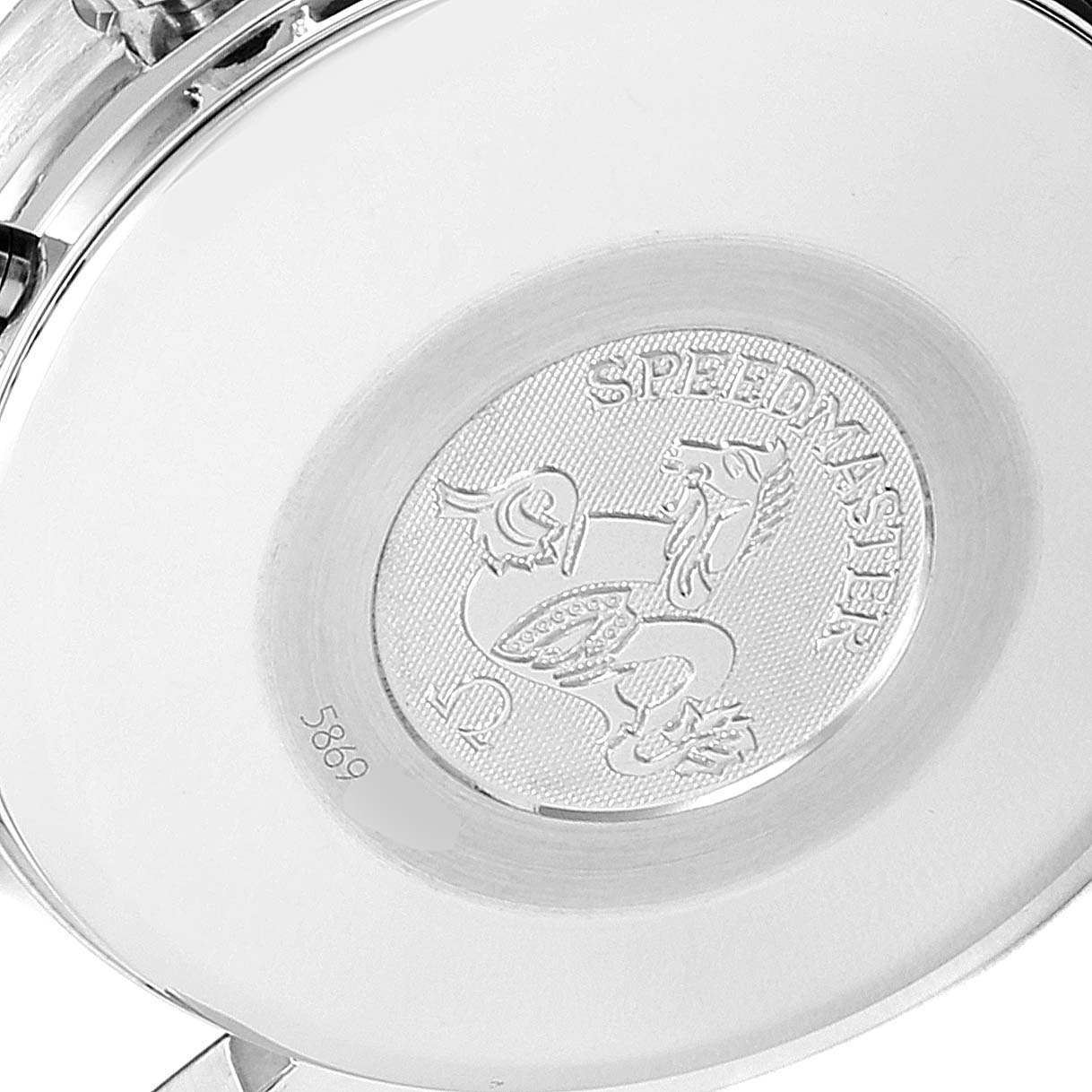 This image shows a close-up of the case back of an Omega Speedmaster 3523.80.00 Men
s Stainless Steel Blue Dial 3523.80.00 Men
s Stainless Steel Blue Dial watch, featuring the emblem and model name.