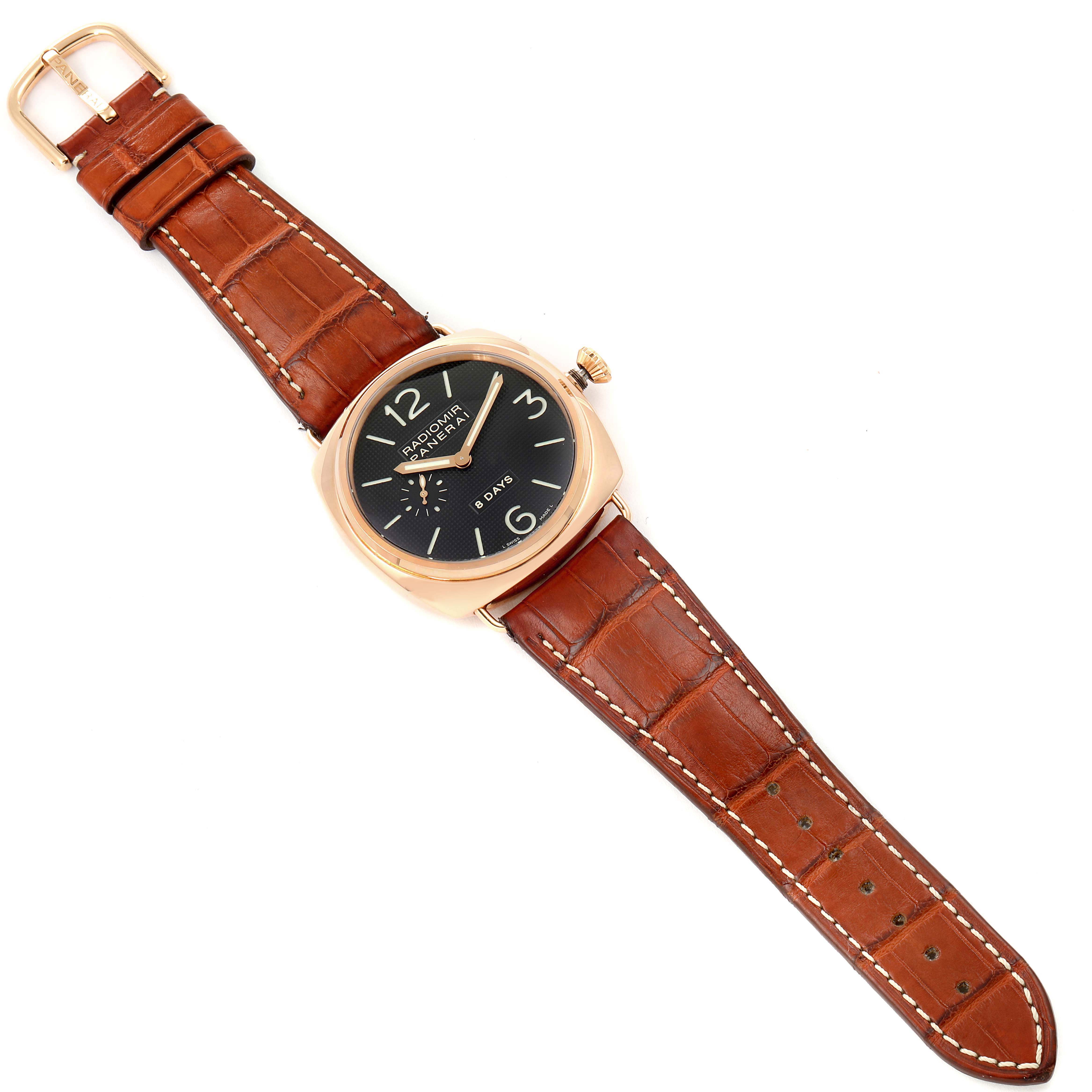 The Panerai Radiomir PAM00197 Men's Rose Gold Black Dial PAM00197 Men's Rose Gold Black Dial watch is shown from a top view, highlighting the dial, case, crown, and brown leather strap with stitching.