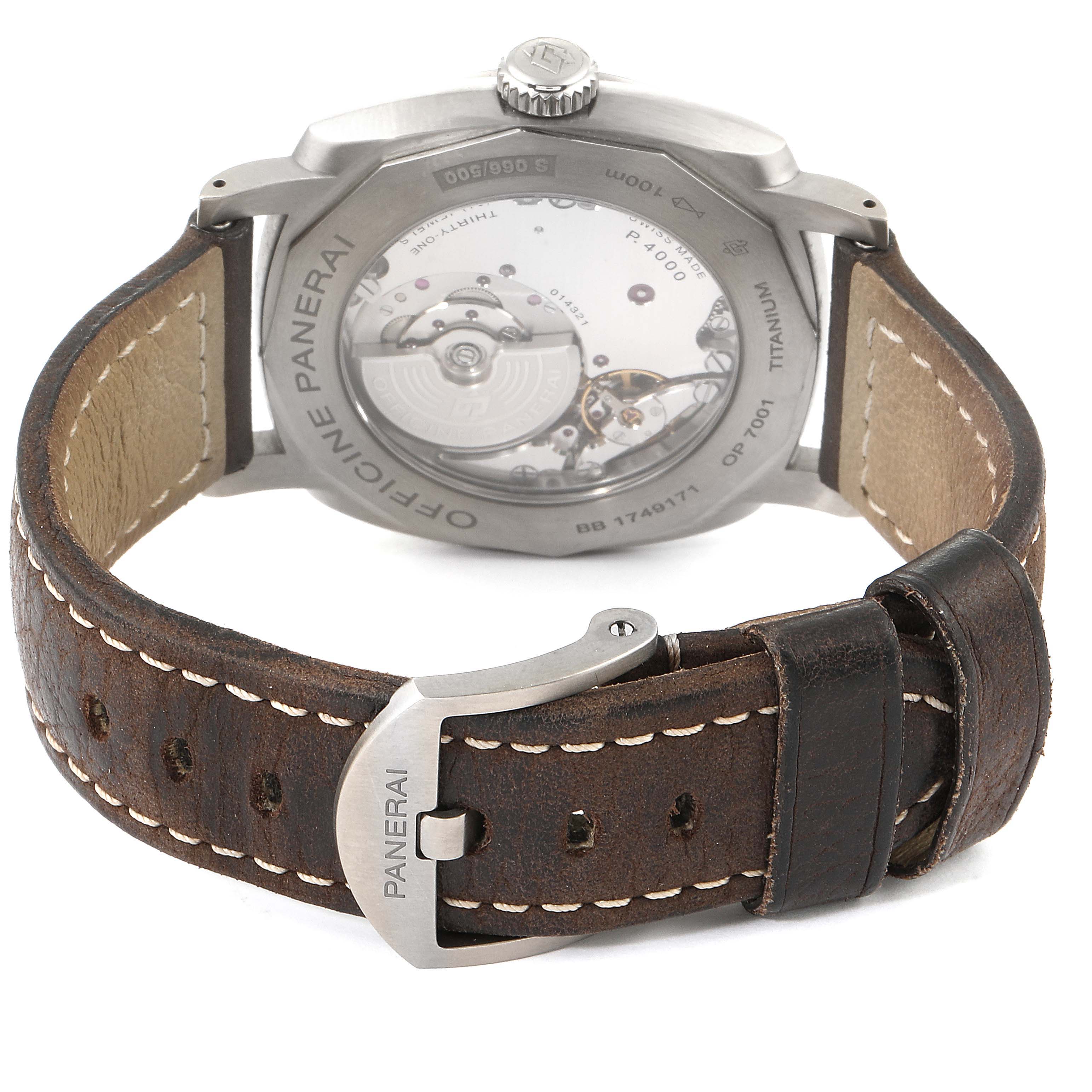 The image shows the back view of a Panerai Radiomir PAM00619 Men's Titanium Brown Dial PAM00619 Men's Titanium Brown Dial watch, highlighting the movement and brown leather strap with buckle.