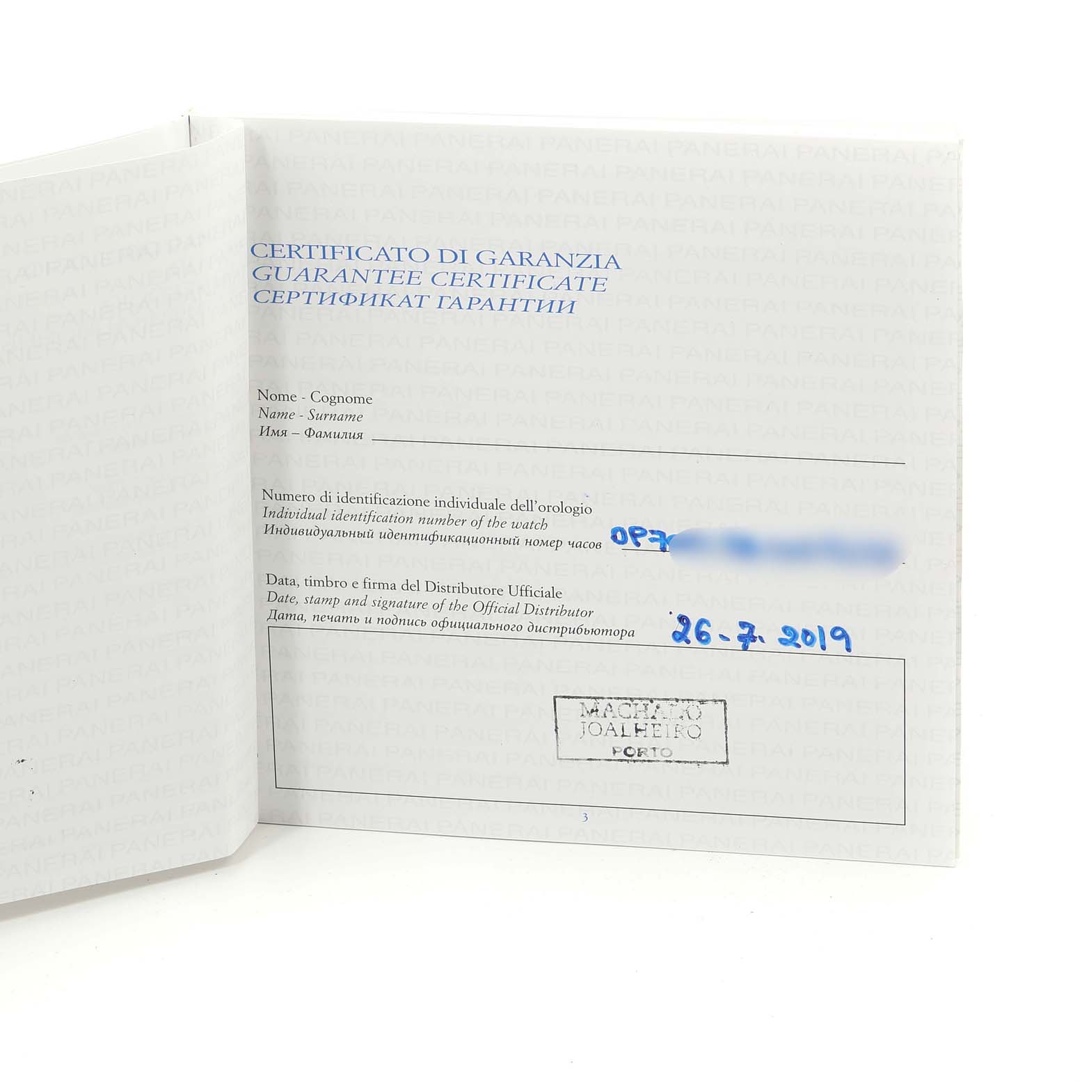 This image shows the guarantee certificate for a Radiomir model by Panerai, open to the identification and distributor information page.