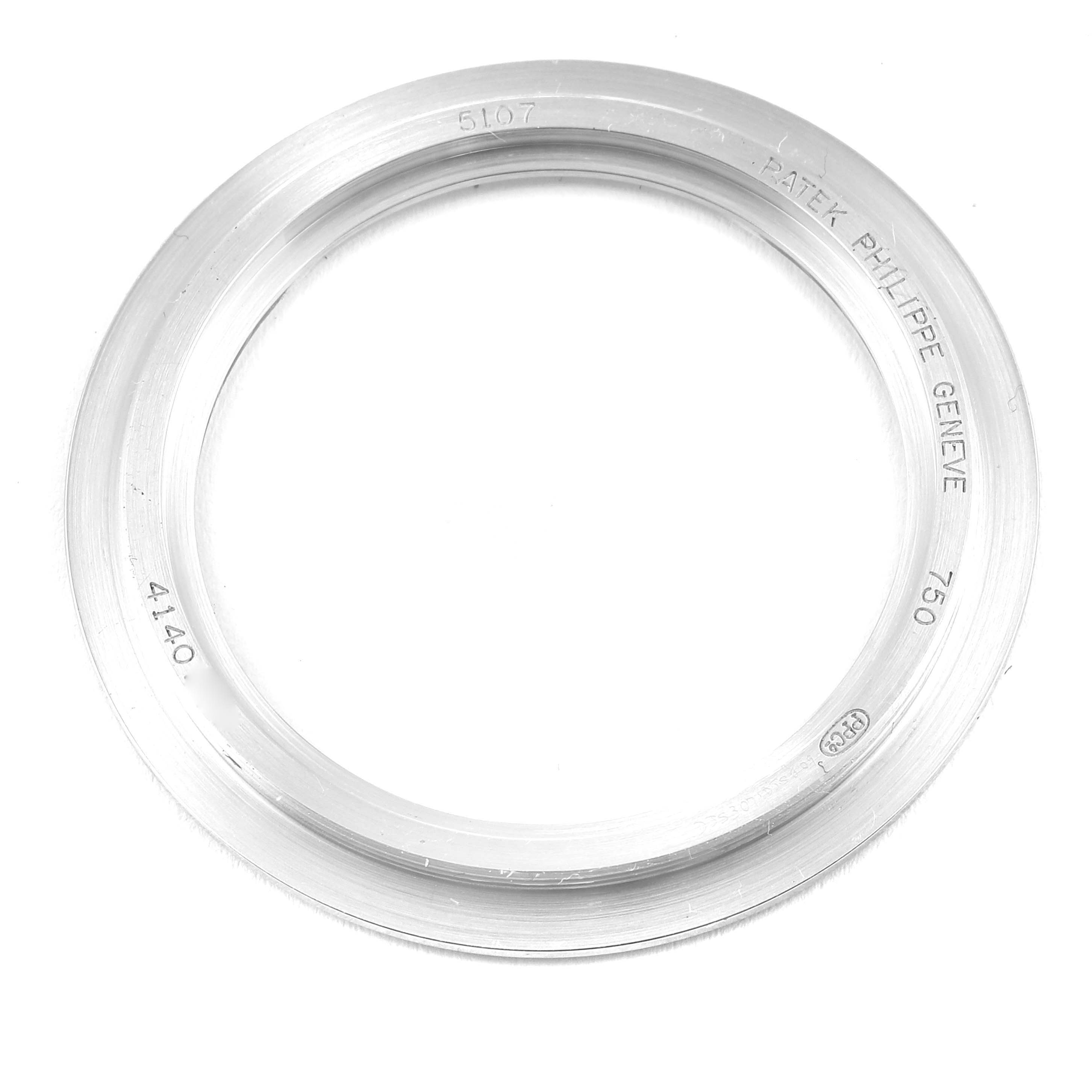 This image shows a close-up of the bezel for a Patek Philippe Calatrava 5107G Men
s White Gold Silver Dial 5107G Men
s White Gold Silver Dial watch, viewed from above.