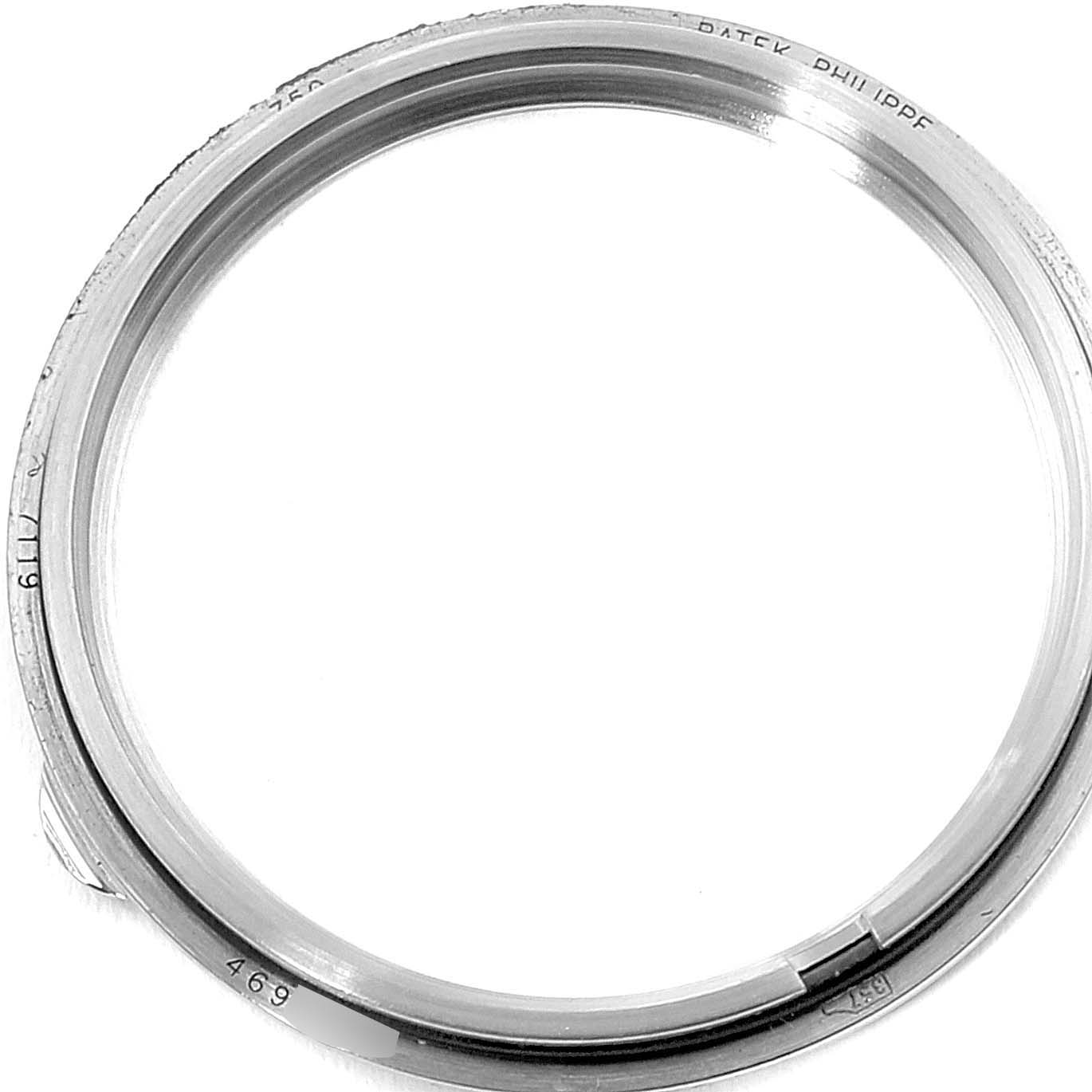 The image shows the metal bezel ring from a Patek Philippe Calatrava 7119G Women's White Gold White Dial 7119G Women's White Gold White Dial watch, viewed from the top.
