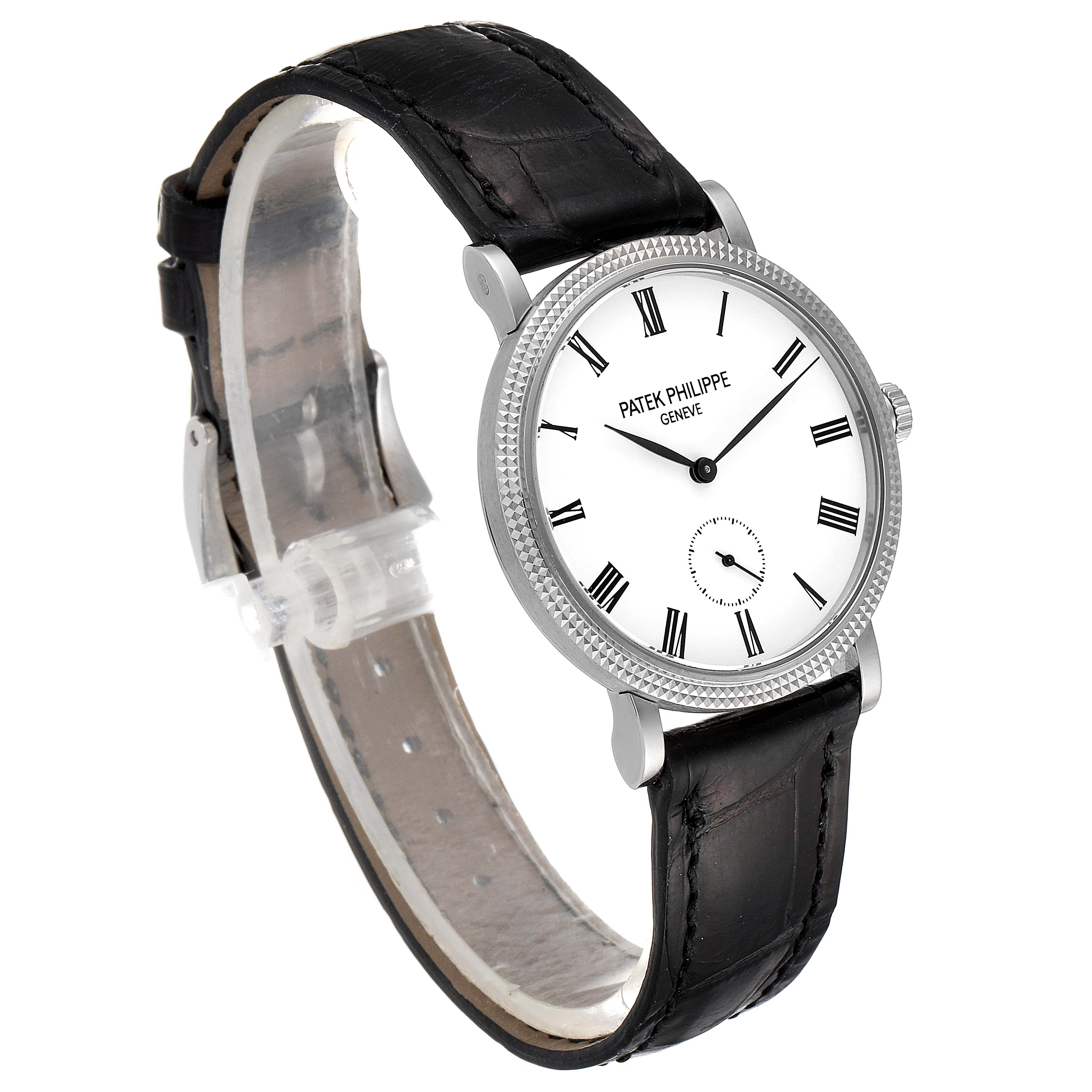 The image shows a Patek Philippe Calatrava 7119G Women's White Gold White Dial 7119G Women's White Gold White Dial watch at a three-quarter angle, displaying the face, bezel, strap, and crown.