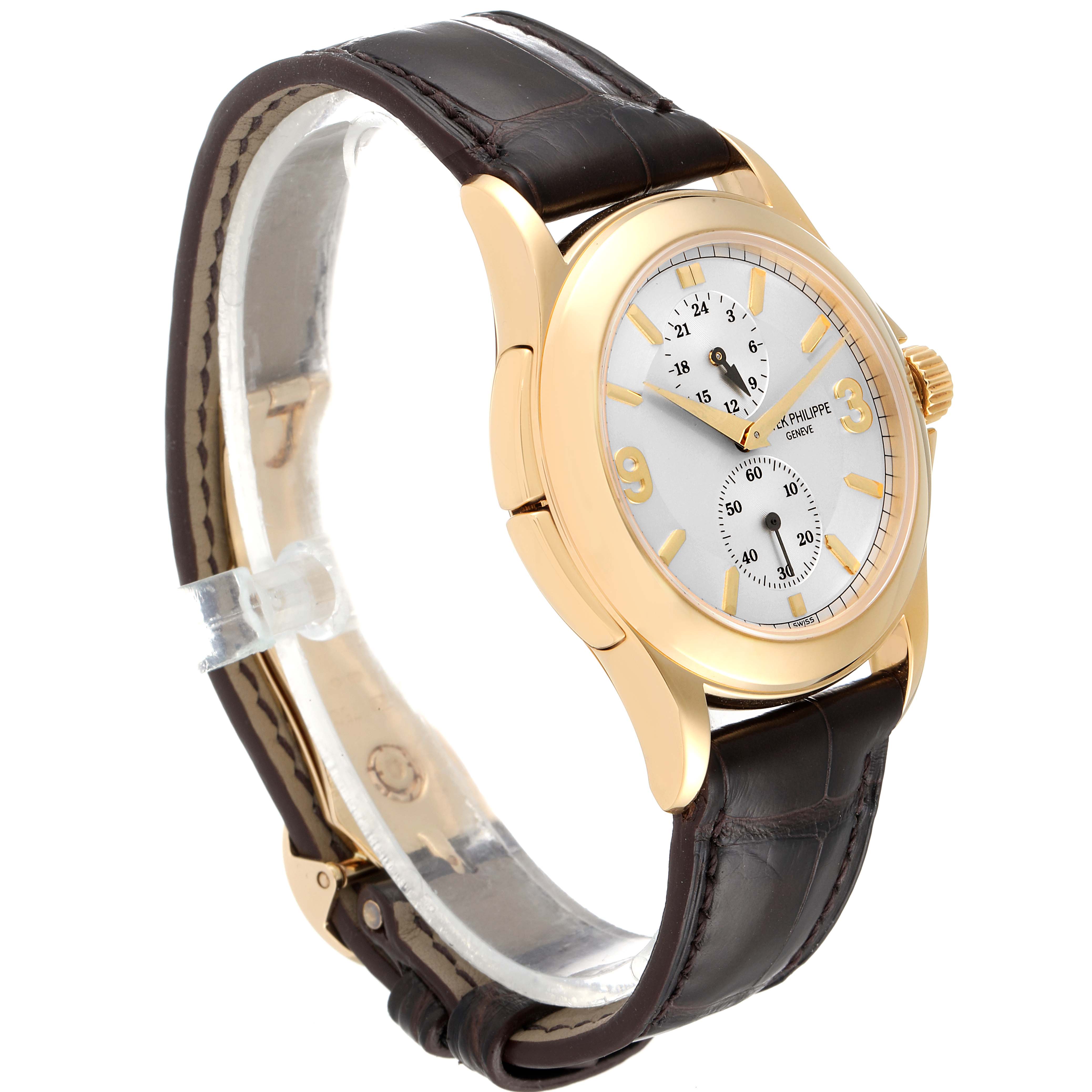 The image shows a side angle of the Patek Philippe Calatrava 5134J Men
s Yellow Gold White Dial 5134J Men
s Yellow Gold White Dial watch, displaying its dial, case, and leather strap.