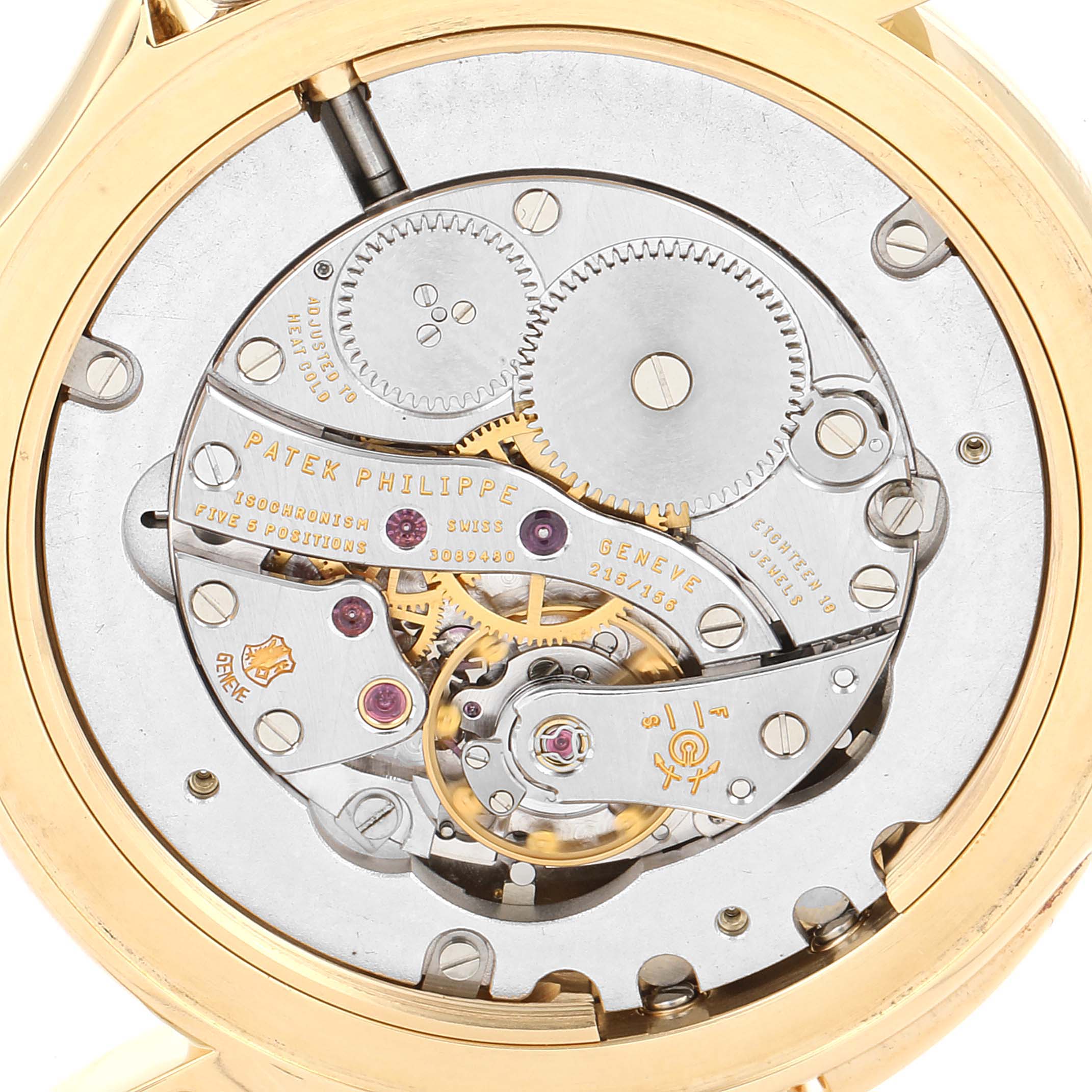 This image shows the back view of the Patek Philippe Calatrava 5134J Men
s Yellow Gold White Dial 5134J Men
s Yellow Gold White Dial watch, highlighting its intricate movement and components.