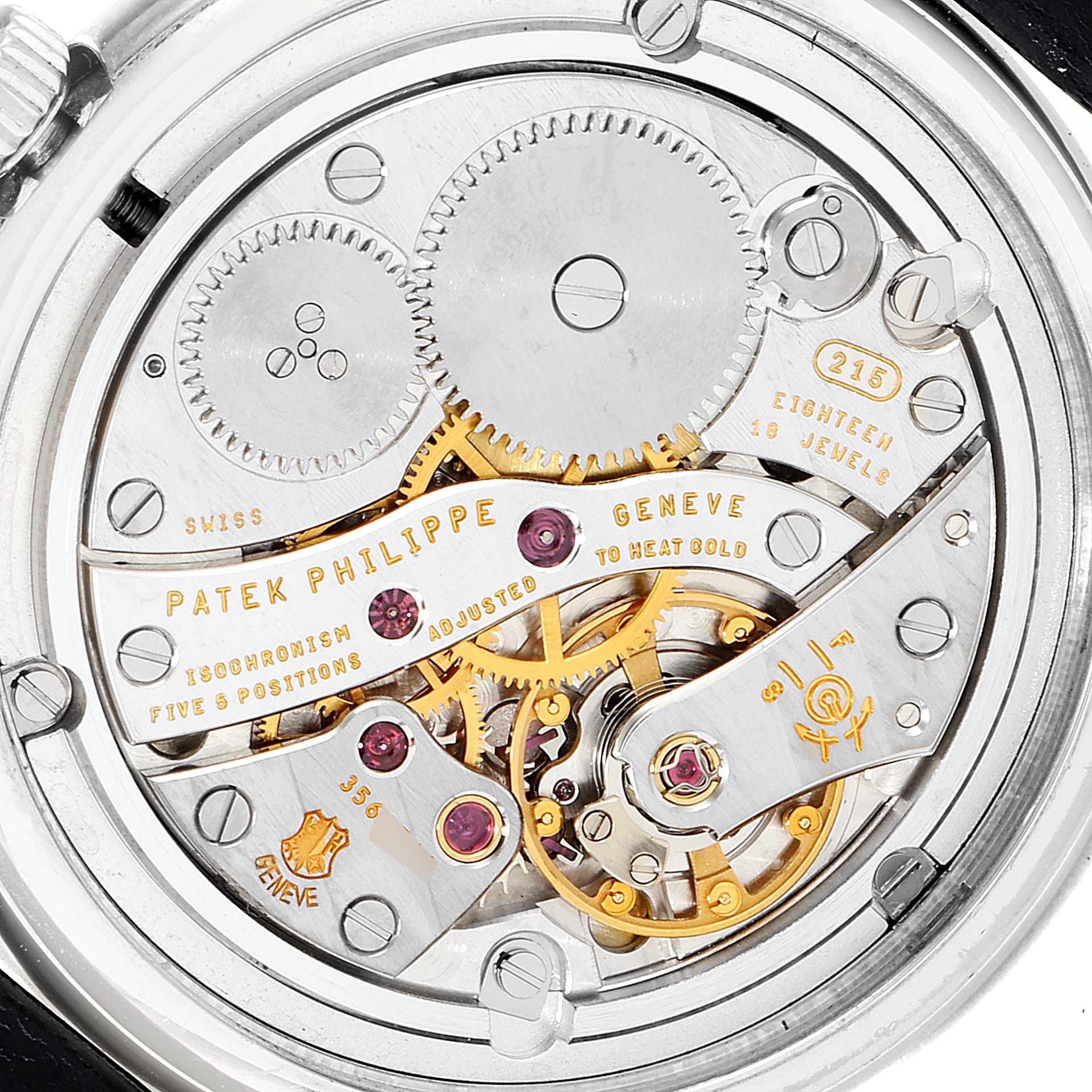 This image shows a close-up view of the intricate mechanical movement of a Patek Philippe Calatrava 4959G Women's White Gold Mother of Pearl Dial 4959G Women's White Gold Mother of Pearl Dial watch.