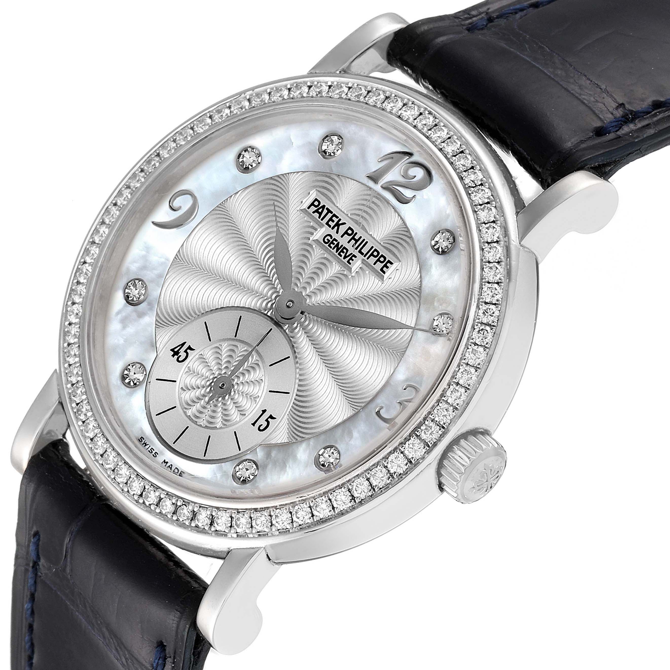 The image shows a close-up, angled view of a Patek Philippe Calatrava 4959G Women's White Gold Mother of Pearl Dial 4959G Women's White Gold Mother of Pearl Dial watch, highlighting its face, bezel, and part of the strap.