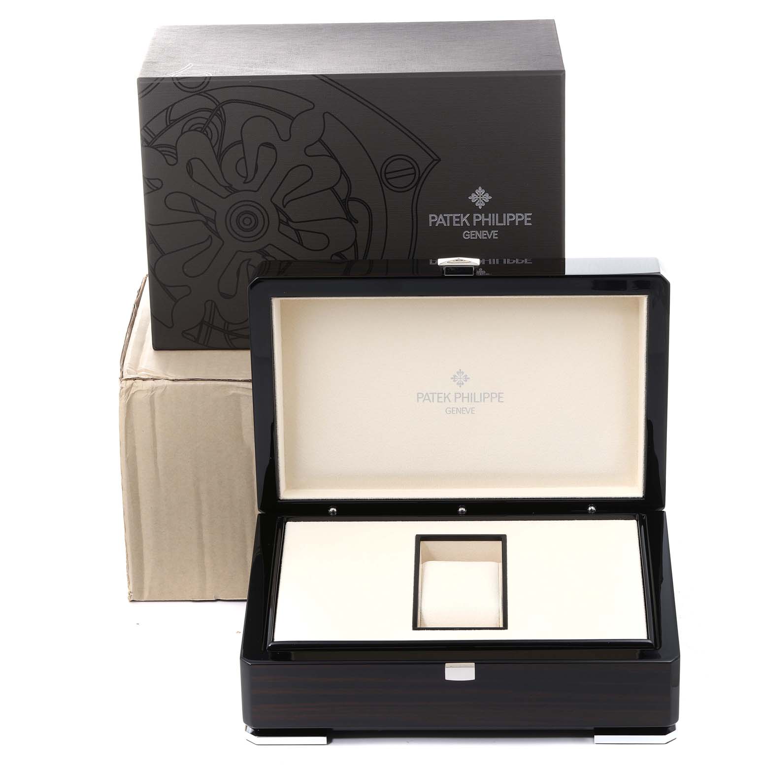 The image shows the packaging for a Nautilus model by Patek Philippe, including an open presentation box and outer packaging.
