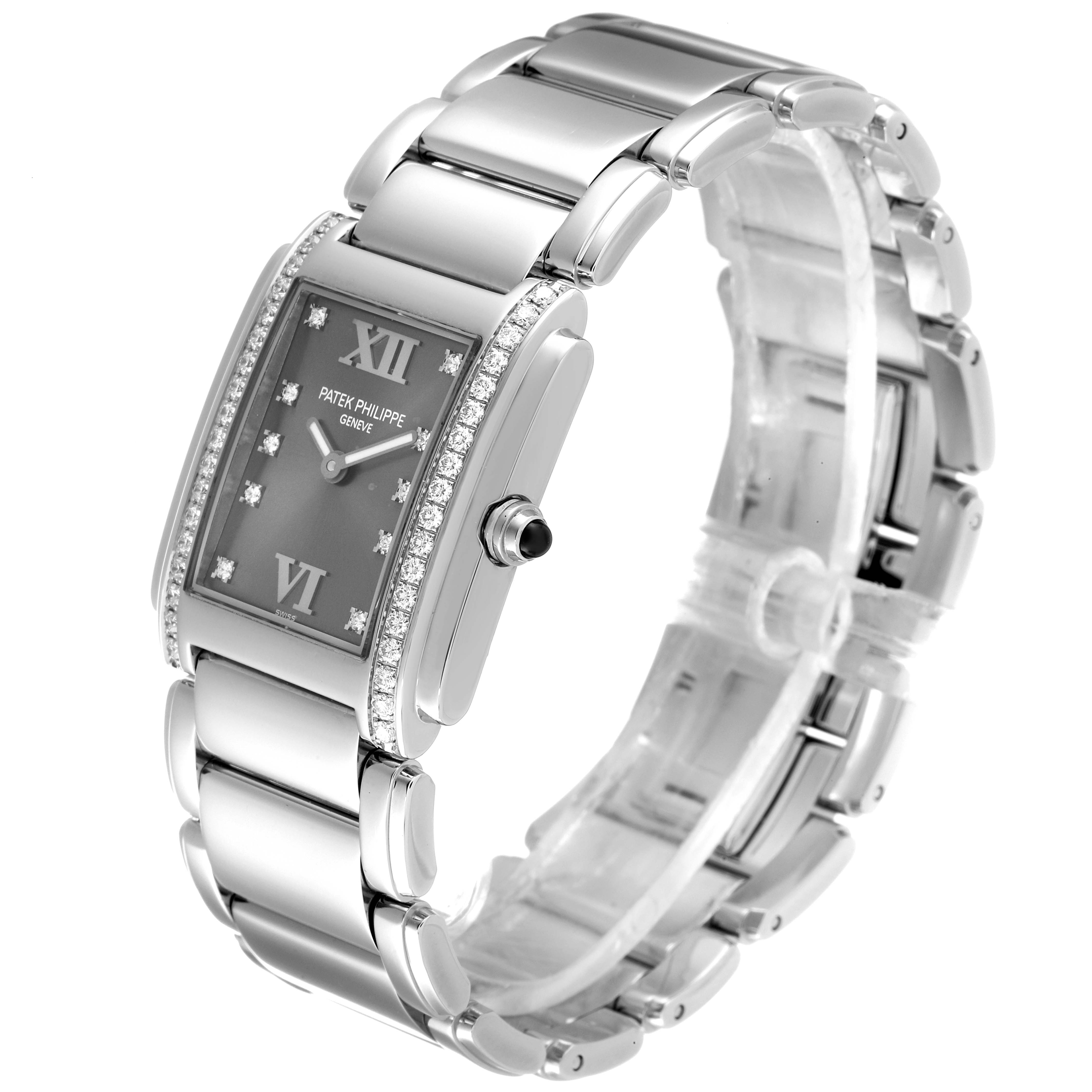 The image shows a Patek Philippe Twenty-4 4910/10A-010 Women's Stainless Steel Grey Dial 4910/10A-010 Women's Stainless Steel Grey Dial watch at a slight angle, highlighting its face, bracelet, and diamond accents.