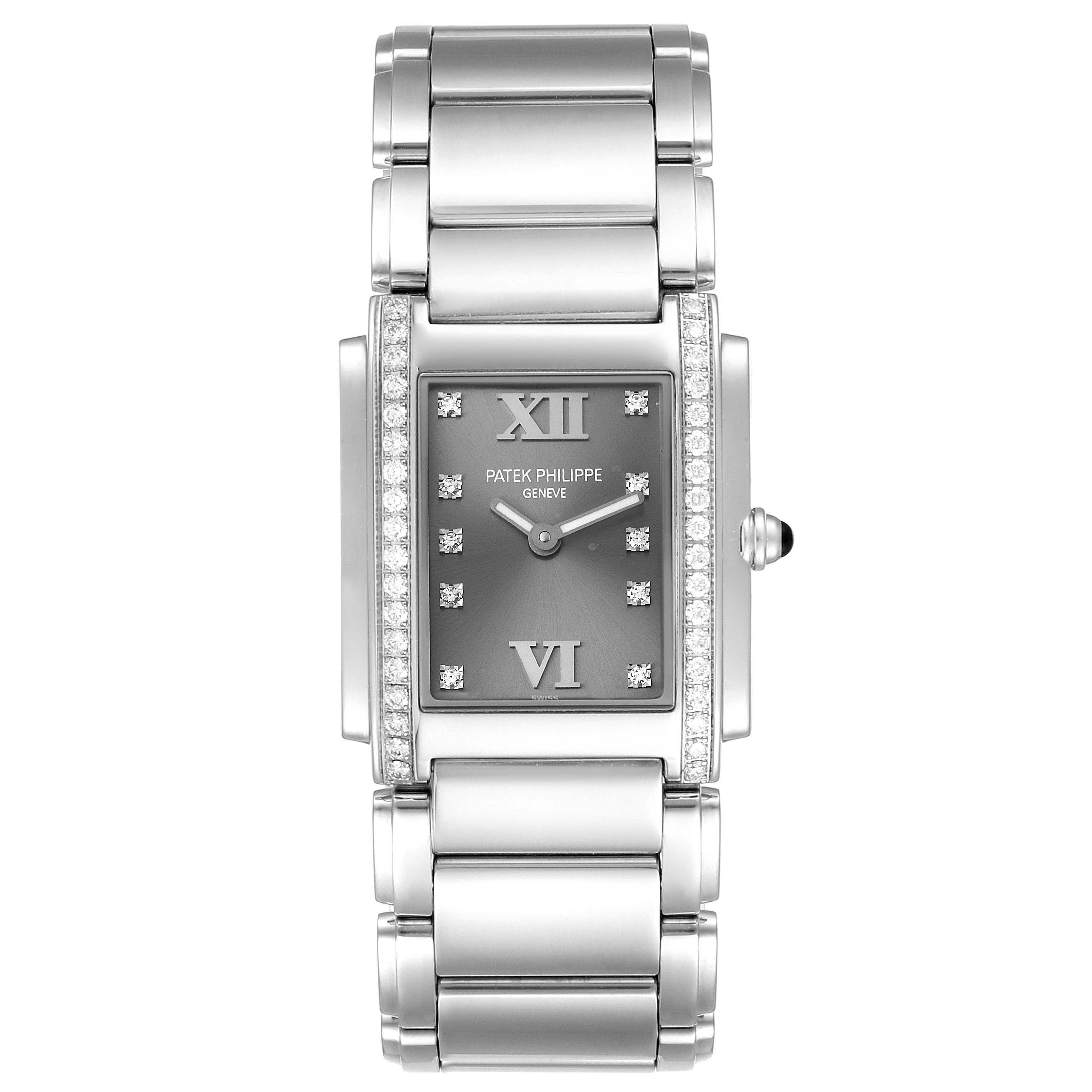 The image shows a top view of a Patek Philippe Twenty-4 4910/10A-010 Women's Stainless Steel Grey Dial 4910/10A-010 Women's Stainless Steel Grey Dial watch, highlighting the bracelet, bezel, and dial.