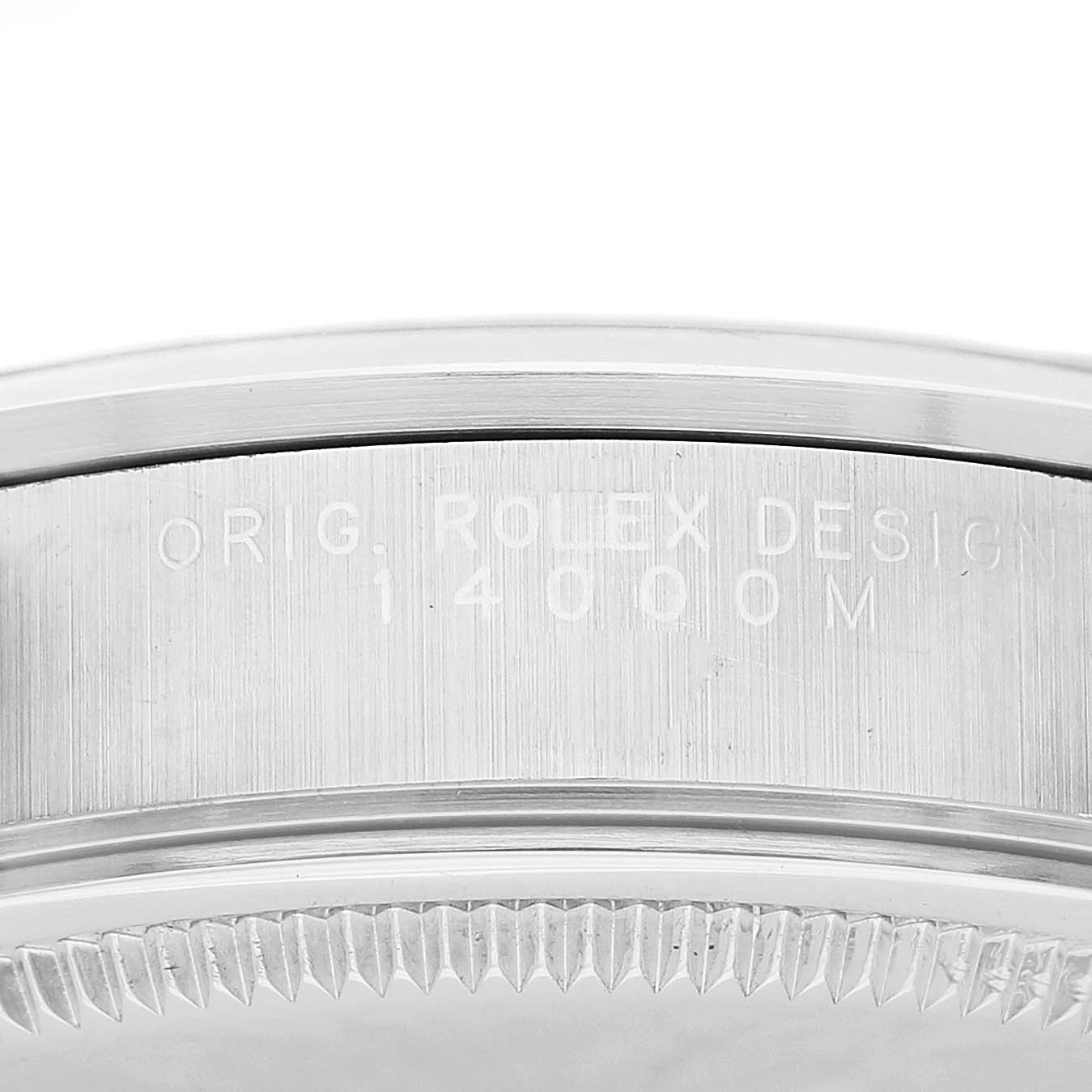 The image shows the side engraving of a Rolex Air-King 14000 Men's Stainless Steel Black Dial, featuring model details and a close-up of the bezel edge.