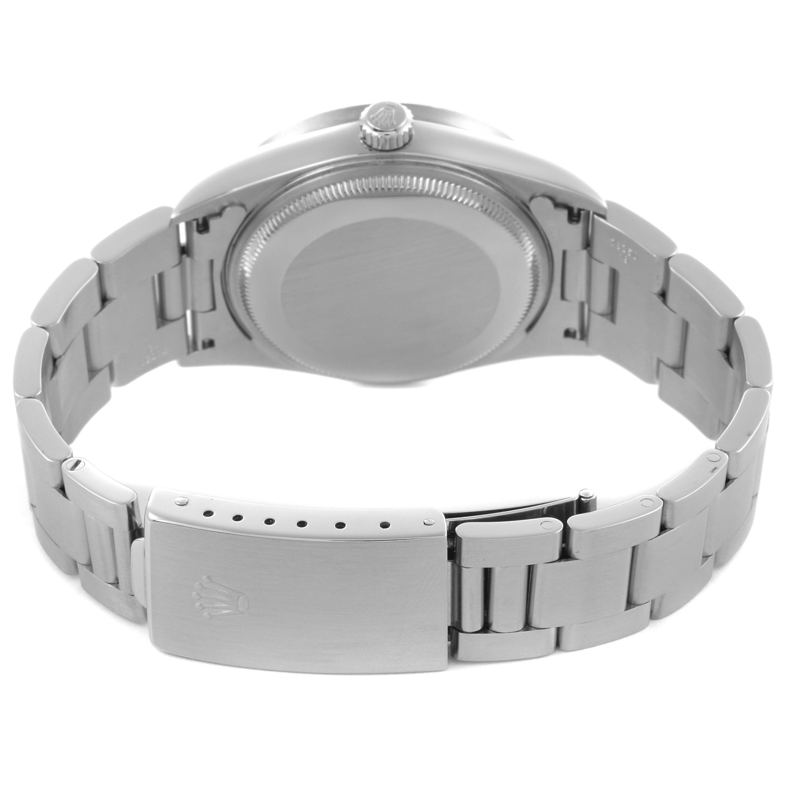 The image shows the Rolex Air-King 14010M Men's Stainless Steel Black Dial 14010M Men's Stainless Steel Black Dial watch from the back, displaying the clasp, bracelet, and case back.