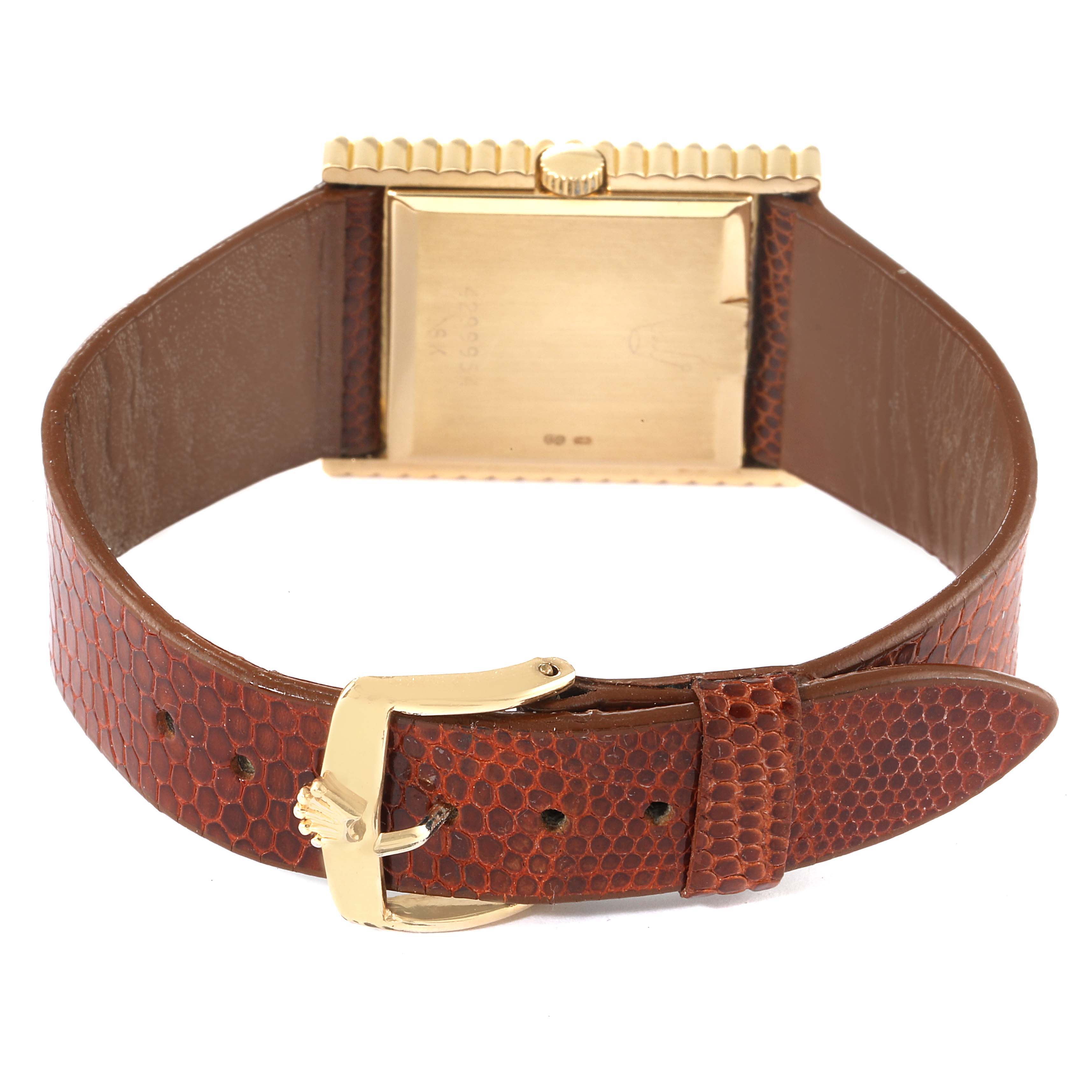 The image shows the back and clasp of a Rolex Cellini 4012 Men's Yellow Gold Champagne Dial 4012 Men's Yellow Gold Champagne Dial watch with a brown leather strap.