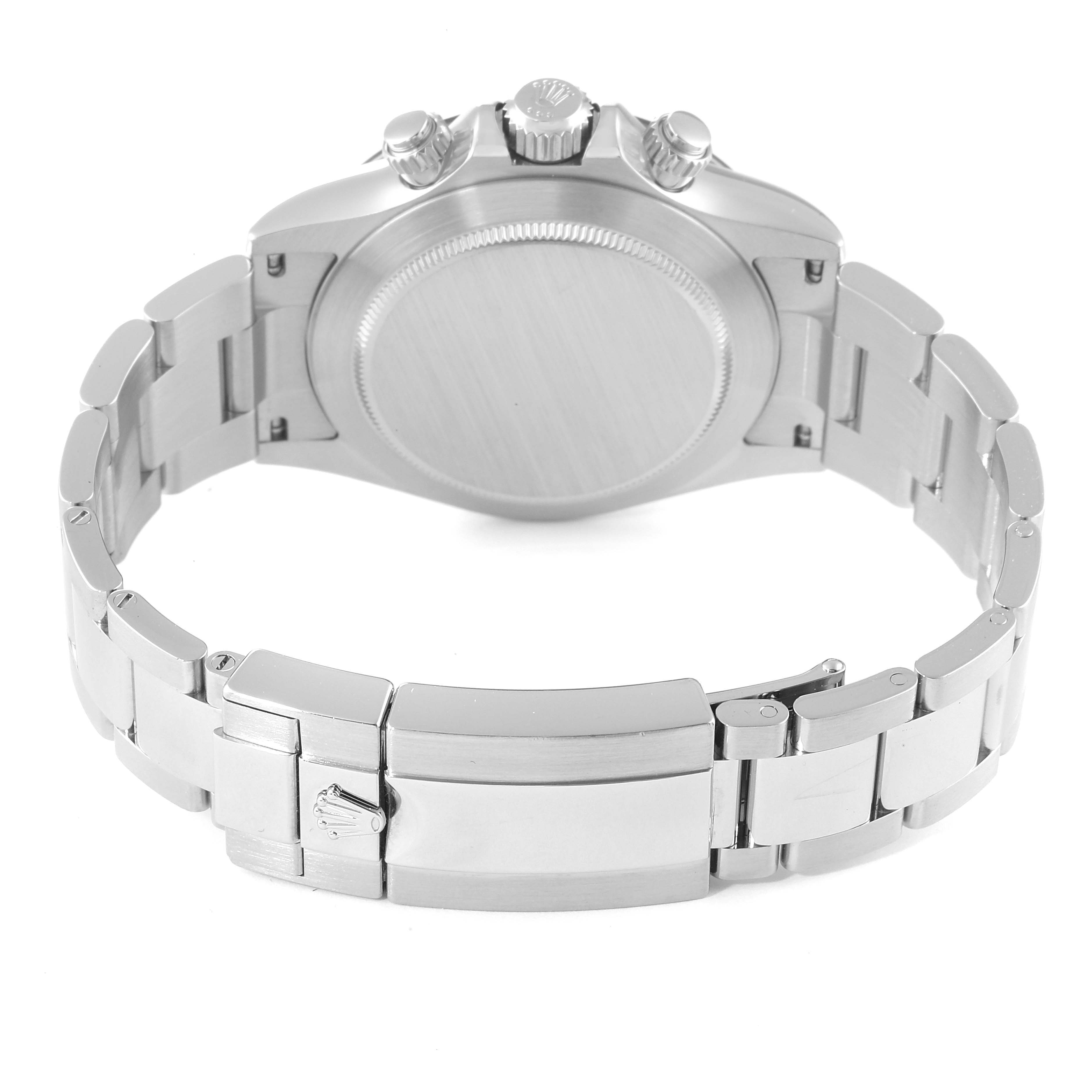 The image shows the back of a Rolex Daytona 116500 Men's Stainless Steel Black Dial 116500 Men's Stainless Steel Black Dial watch, highlighting its case, screw-down pushers, crown, and bracelet clasp.