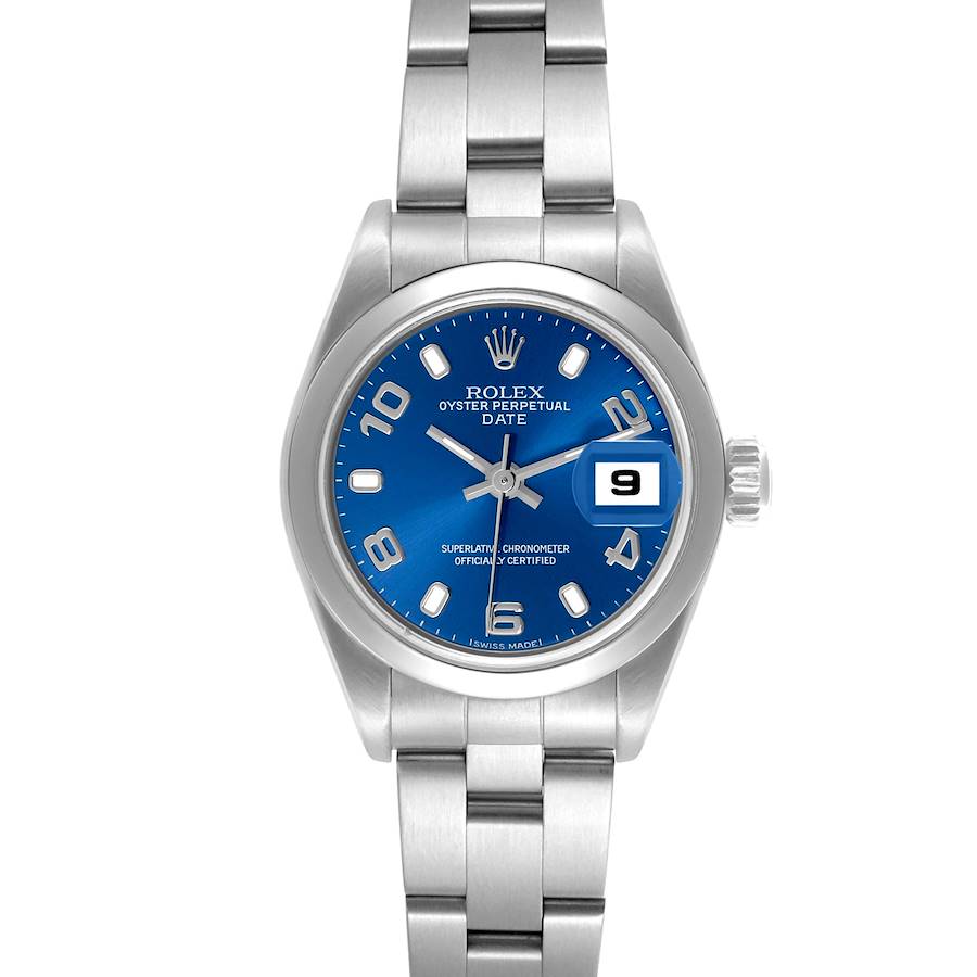 The Rolex Date model watch is shown from the front, displaying its blue dial, date window, and stainless steel bracelet.