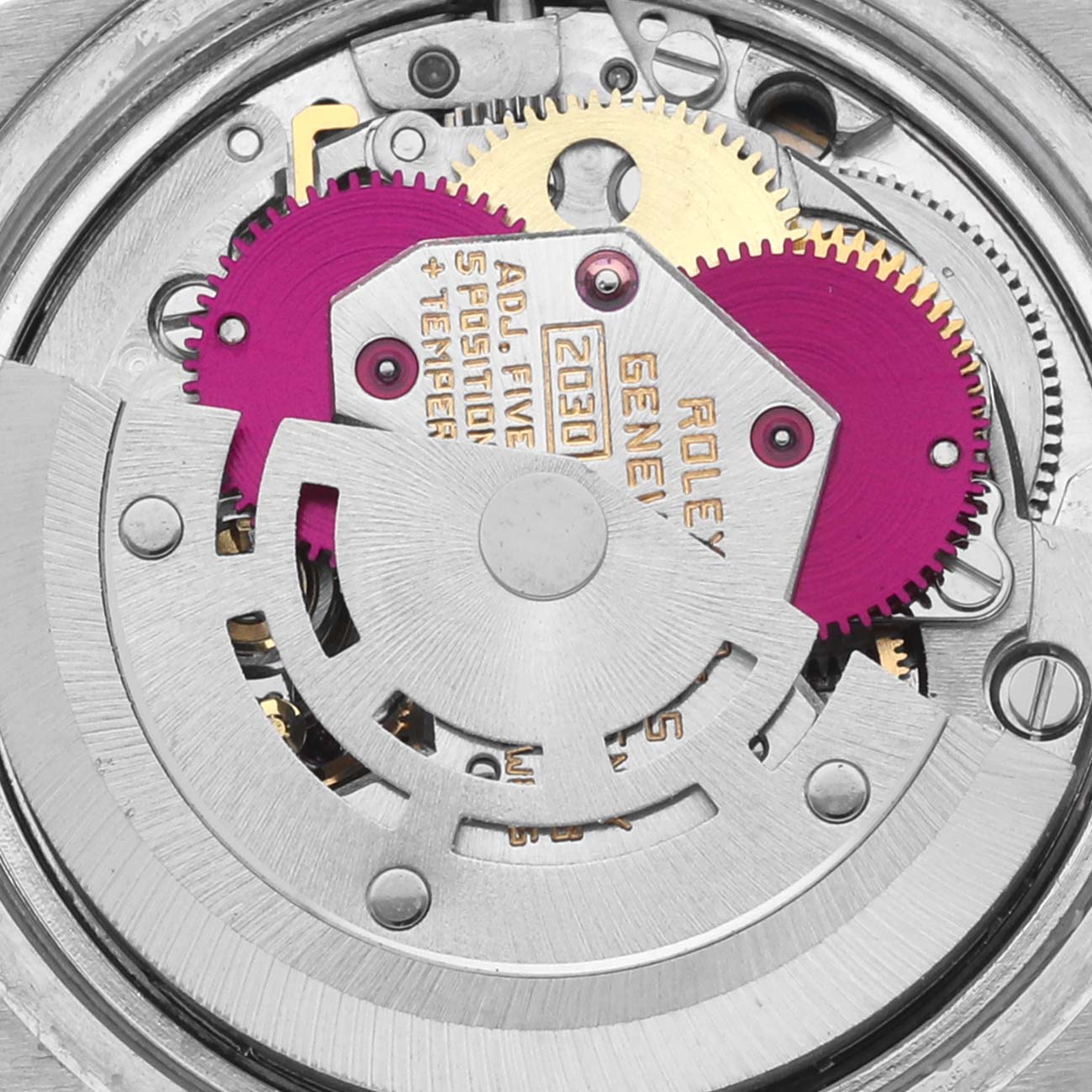 The image shows the movement mechanism of a Rolex Date 6917 Women's Stainless Steel Blue Dial 6917 Women's Stainless Steel Blue Dial model watch, focusing on the rotor and gears.