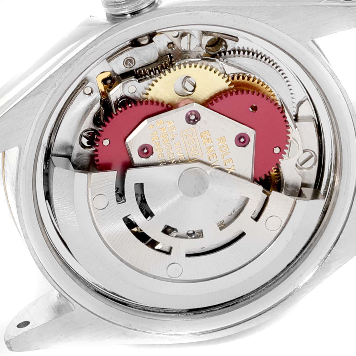 This image shows the internal mechanism and gears of a Rolex Date 6917 Women's Steel and Gold (two tone) Champagne Dial 6917 Women's Steel and Gold (two tone) Champagne Dial model watch from a back angle.
