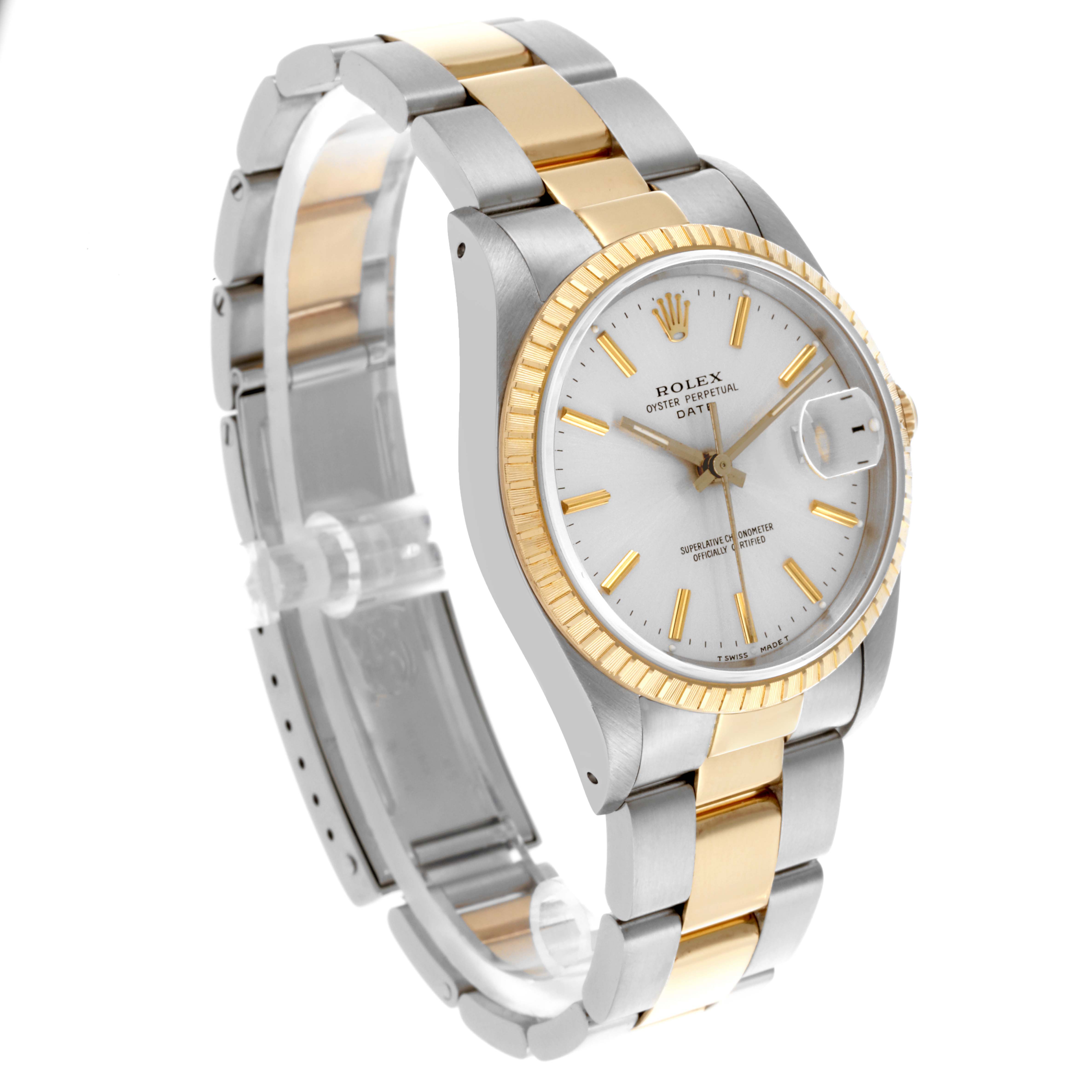The Rolex Date 15223 Men's Steel and Gold (two tone) Silver Dial 15223 Men's Steel and Gold (two tone) Silver Dial model watch is shown at a three-quarter angle, highlighting its two-tone bracelet, fluted bezel, and dial with date display.