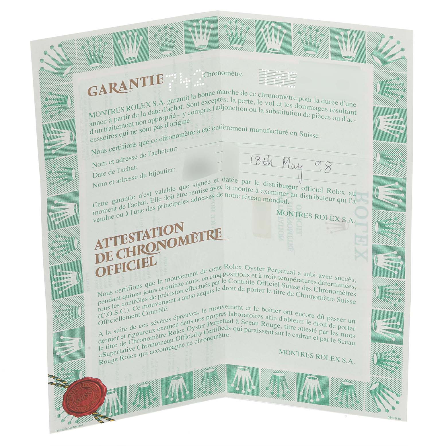 The image shows a warranty certificate for a Rolex Datejust 69173 Women's Steel and Gold (two tone) White Dial 69173 Women's Steel and Gold (two tone) White Dial, angled slightly open.