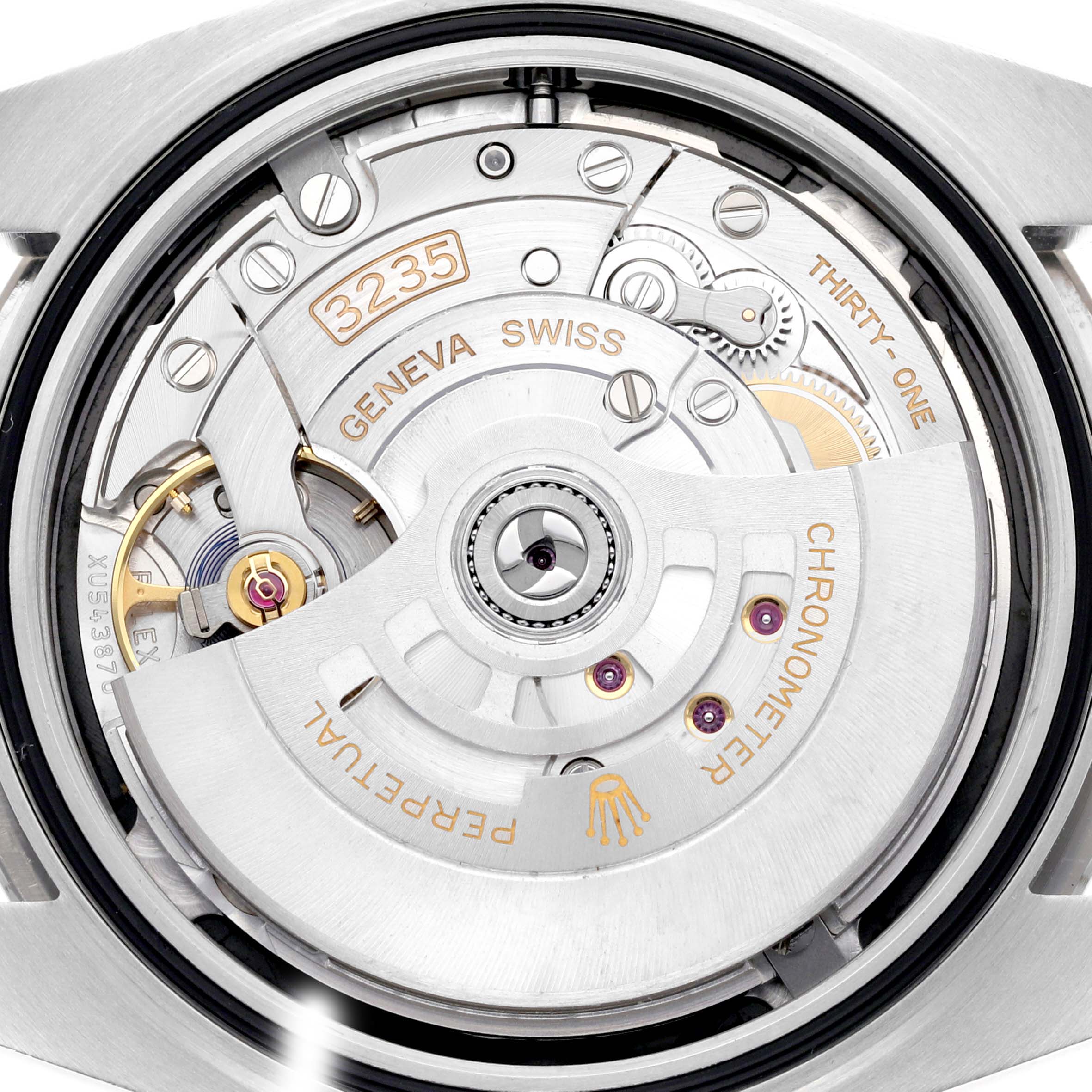 The image shows the movement of the Rolex Datejust 41 126334 Men's Stainless Steel Black Dial 126334 Men's Stainless Steel Black Dial, revealing intricate mechanical components and engravings from a rear angle.