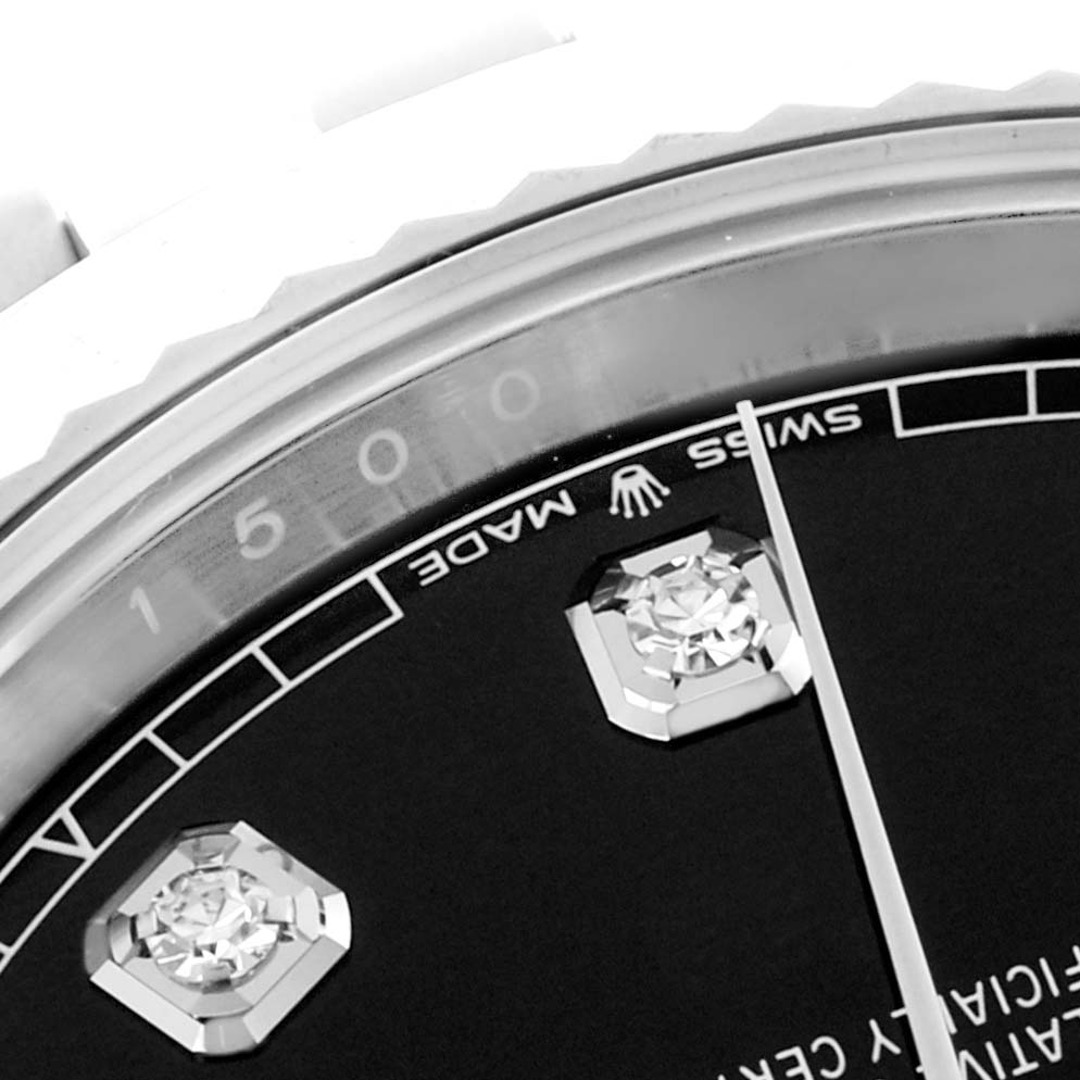 This close-up image of a Rolex Datejust 41 126334 Men's Stainless Steel Black Dial 126334 Men's Stainless Steel Black Dial shows part of the dial, diamond markers, and the "SWISS MADE" text near the bezel.
