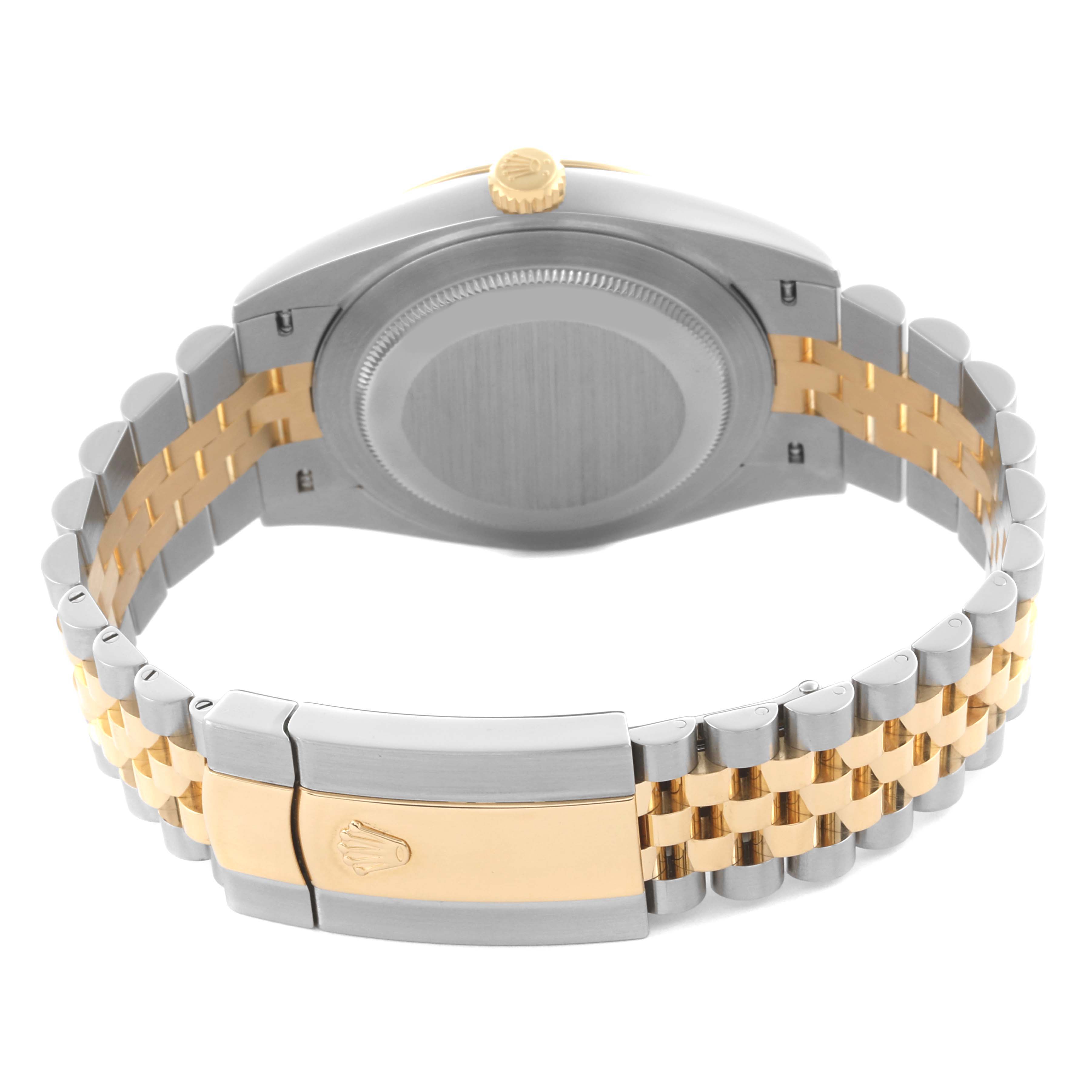 The image shows the backside of a Rolex Datejust 41 126303 Men
s Steel and Gold (two tone) Champagne Dial 126303 Men
s Steel and Gold (two tone) Champagne Dial, highlighting the case back, crown, and two-tone bracelet with clasp.