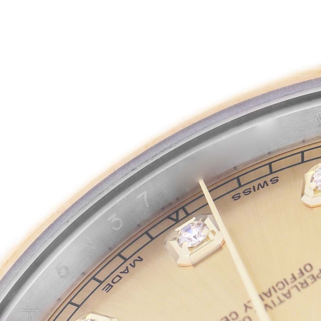 The image shows a close-up of the dial and bezel of the Rolex Datejust 41 116333 Men's Steel and Gold (two tone) Champagne Dial, highlighting the diamond hour markers and minute track.