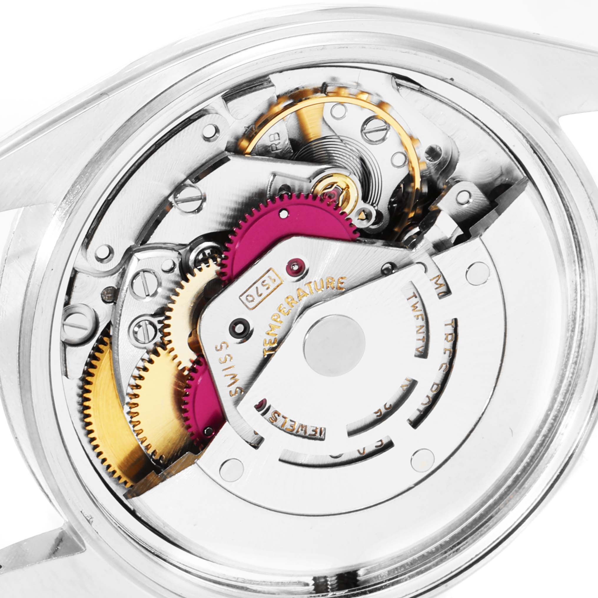 The image shows the back view of the mechanism of the Rolex Vintage Collection 1603 Men's Stainless Steel Silver Dial 1603 Men's Stainless Steel Silver Dial model, highlighting its intricate gears and components.